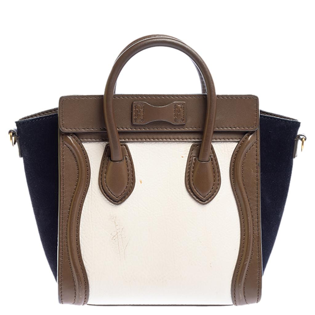 The Nano Luggage tote from Celine is one of the most popular handbags in the world. This tote is crafted from leather and suede and designed in subtle shades. It comes with rolled top handles, a detachable shoulder strap and a front zip pocket. The