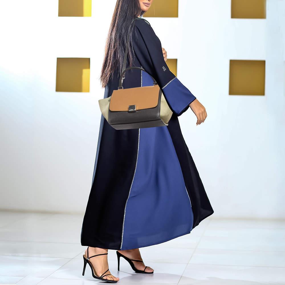 Designer bags are ideal companions for ample occasions Here we have a fashion meets functionality piece crafted with precision. It has been equipped with a well sized interior that can easily fit your small essentials.