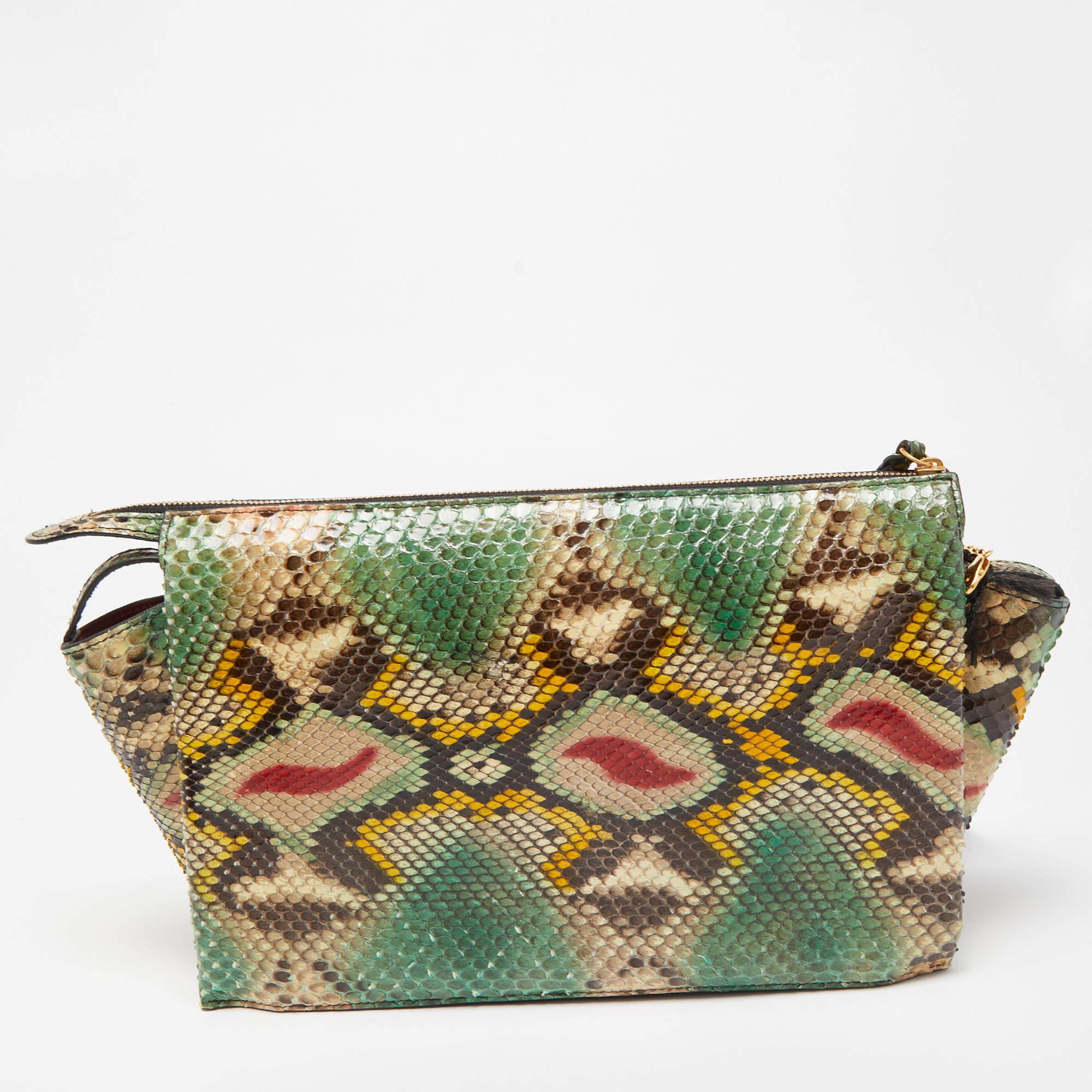 This clutch is just the right accessory to compliment your chic ensemble. It comes crafted in quality material featuring a well-sized interior that can comfortably hold all your little essentials.

