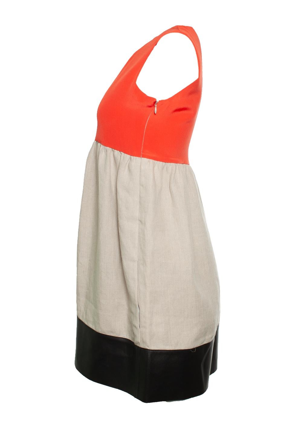 Celine, Multicoloured dress with leather part. The item is new with tag. 

CONDITION: new with tag

SIZE: FR38 - S

MEASUREMENTS: length 85 cm, width 42 cm, waist 38 cm

MATERIAL: linen, silk, lambskin

CARE: dry cleaning

COLOR: orange, grey, black