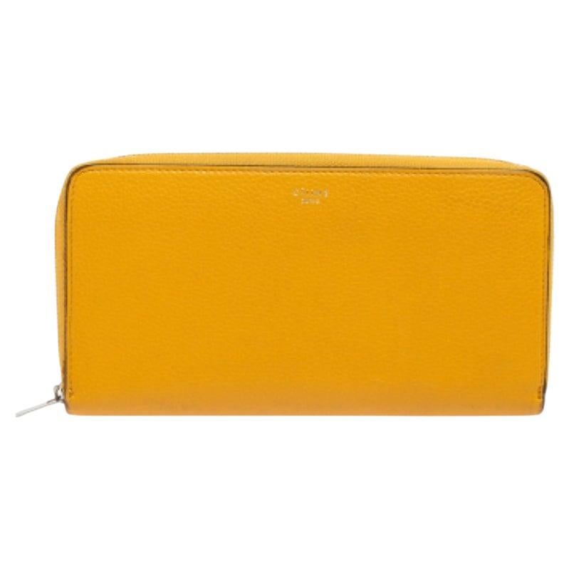 Cartera con cremallera de piel amarilla mostaza Celine en venta