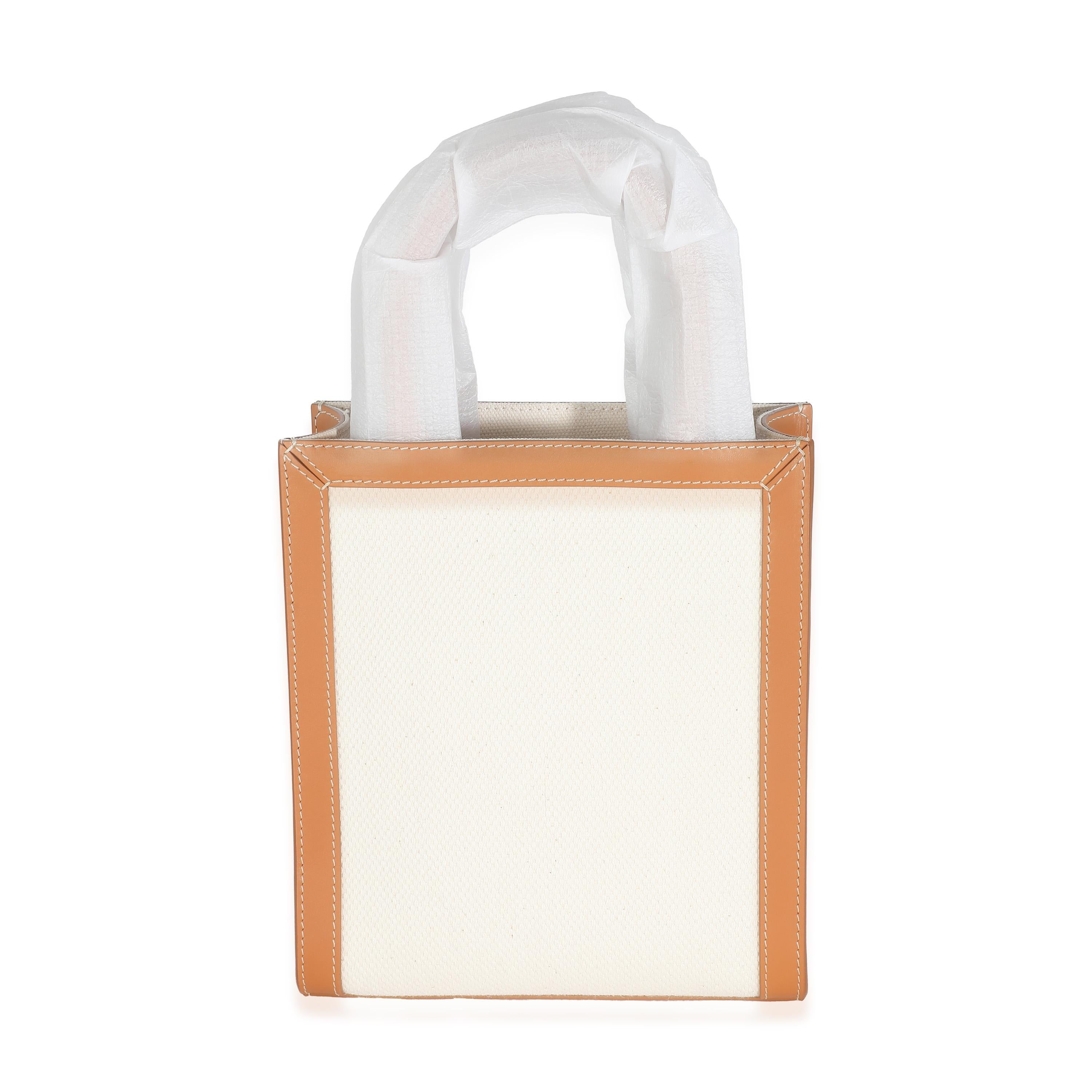 Listing Title: Celine Natural Tan Canvas Calfskin Mini Vertical Cabas
SKU: 143220
Condition: Pre-owned 
Handbag Condition: Pristine
Condition Comments: Item has no indication of wear.  Final sale.
Brand: Celine
Model: Mini Vertical Cabas
Origin