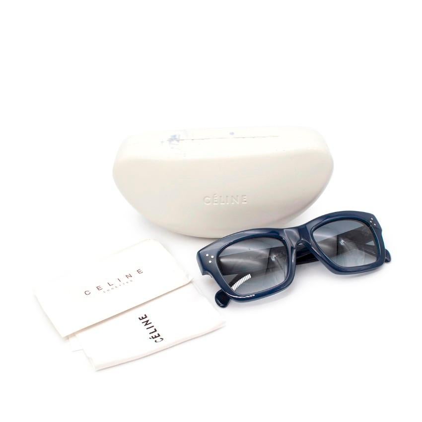 Celine 41732 Navy Wayfarer Sunglasses
 

 - Navy blue sunglasses are cut to a timeless square silhouette
 - Set with dark blue-tinted lenses for a contemporary refresh
 - Made from glossy acetate with a wide frame 
 - Arms accented by silver and