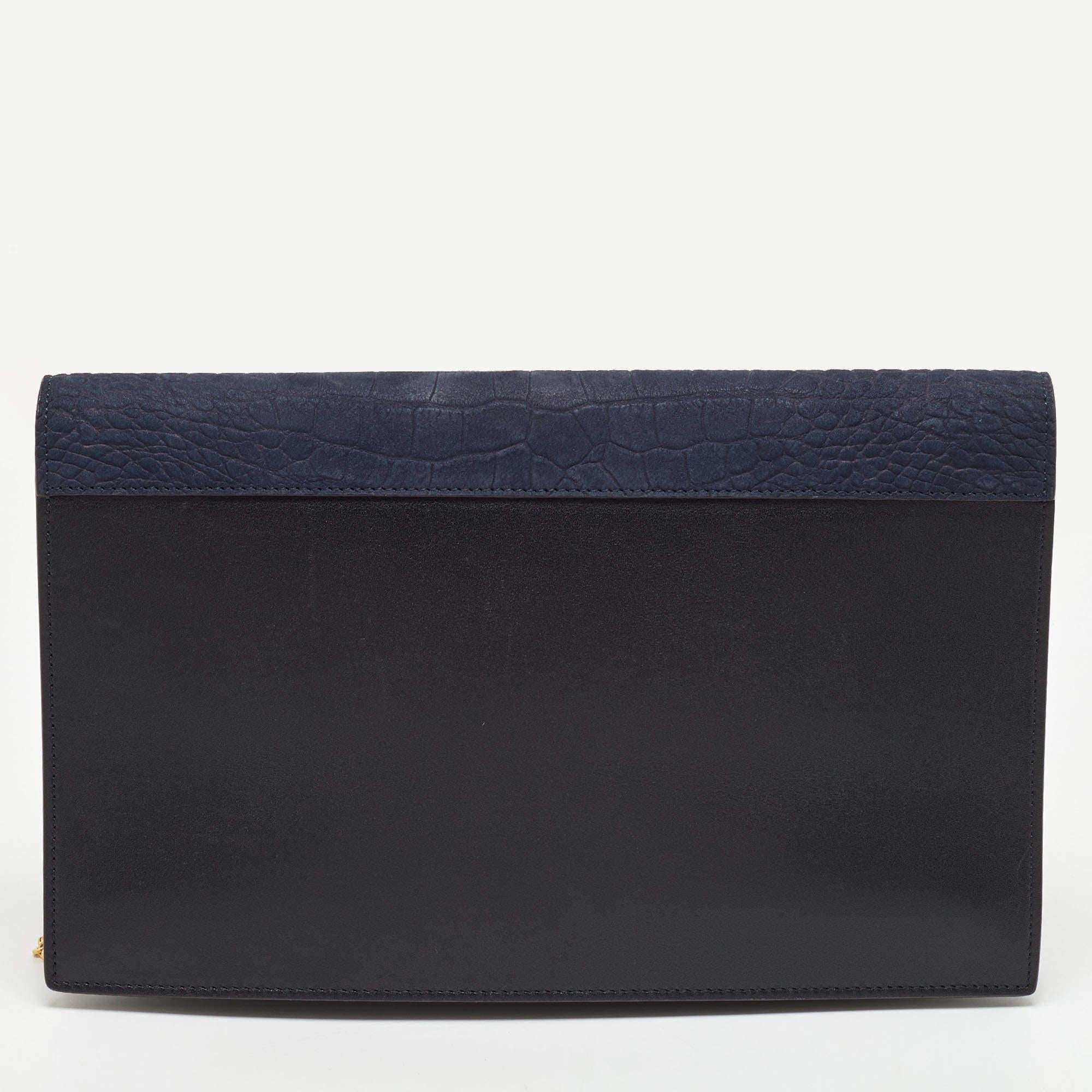 This clutch is just the right accessory to compliment your chic ensemble. It comes crafted in quality material featuring a well-sized interior that can comfortably hold all your little essentials.

Includes: Detachable Strap, Brand Dustbag

