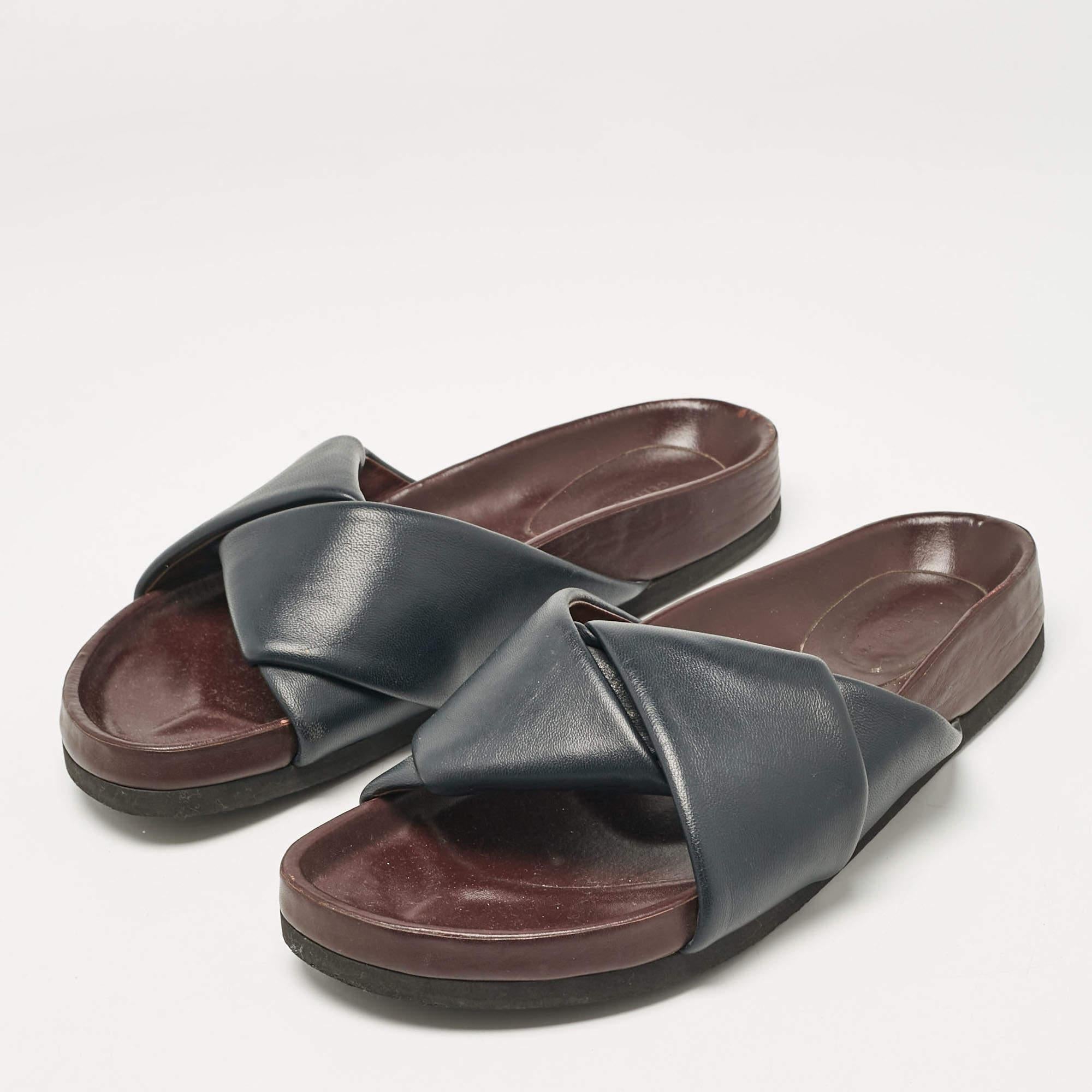 Let this comfortable pair be your first choice when youre out for a long day. These Celine Twist slides for women have well sewn uppers beautifully set on durable soles.