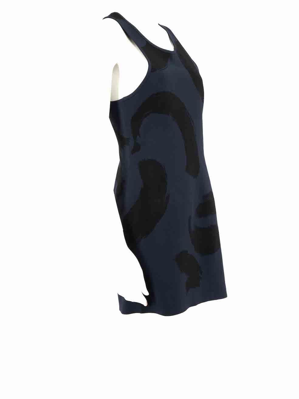 CONDITION is Very good. Minimal wear to dress is evident. Minimal dried glue stains to front right and rear right on this used Céline designer resale item.
 
Details
Navy
Viscose
Bodycon dress
Black paint stroke pattern
Mini
Sleeveless
Round
