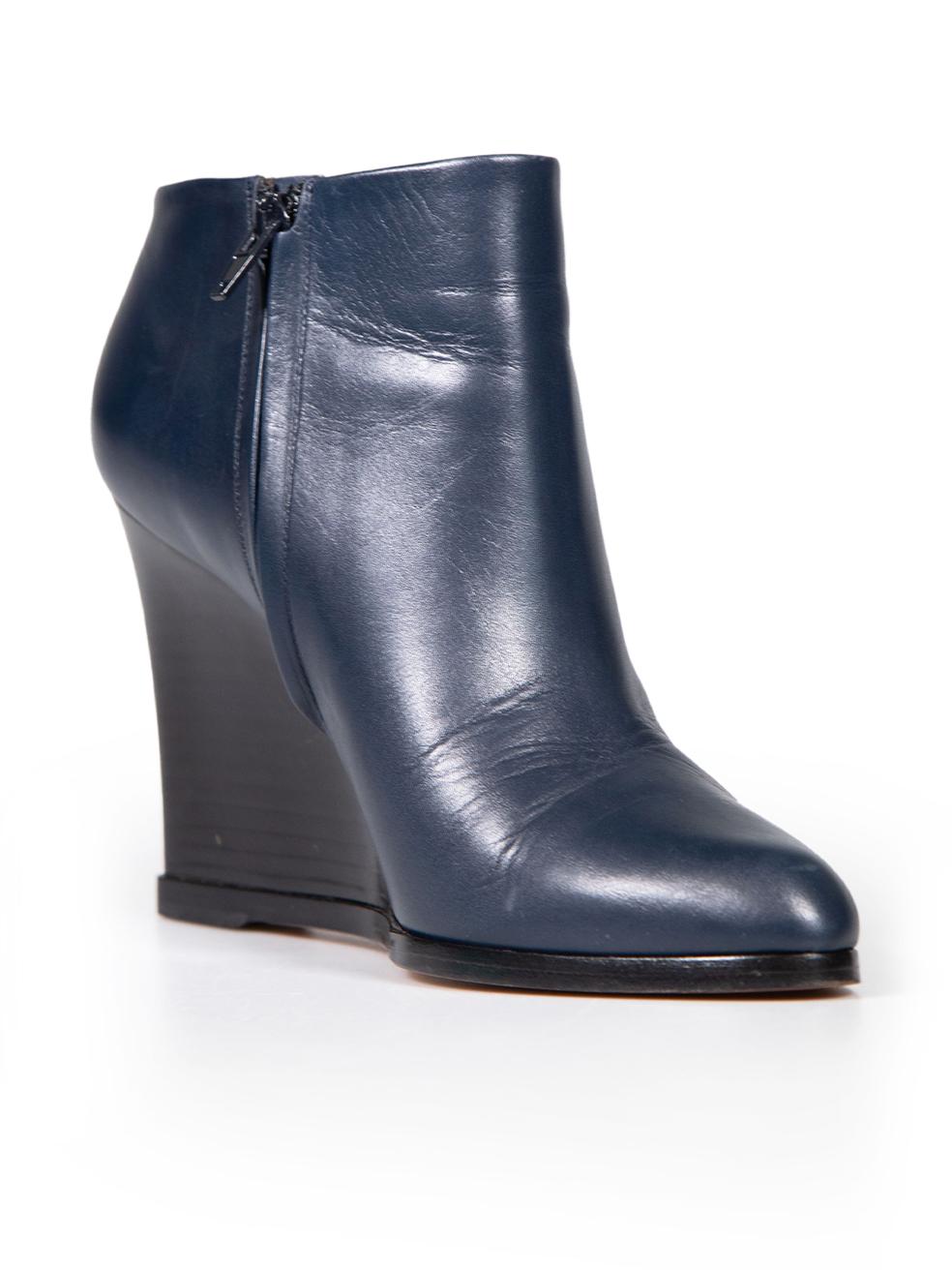 CONDITION is Very good. Minimal wear to wedges is evident. Minimal wear to soles on this used Céline designer resale item.
 
 
 
 Details
 
 
 Navy
 
 Leather
 
 Wedge boots
 
 Point toe
 
 High heeled
 
 Side zip fastening
 
 
 
 
 
 Made in Italy
