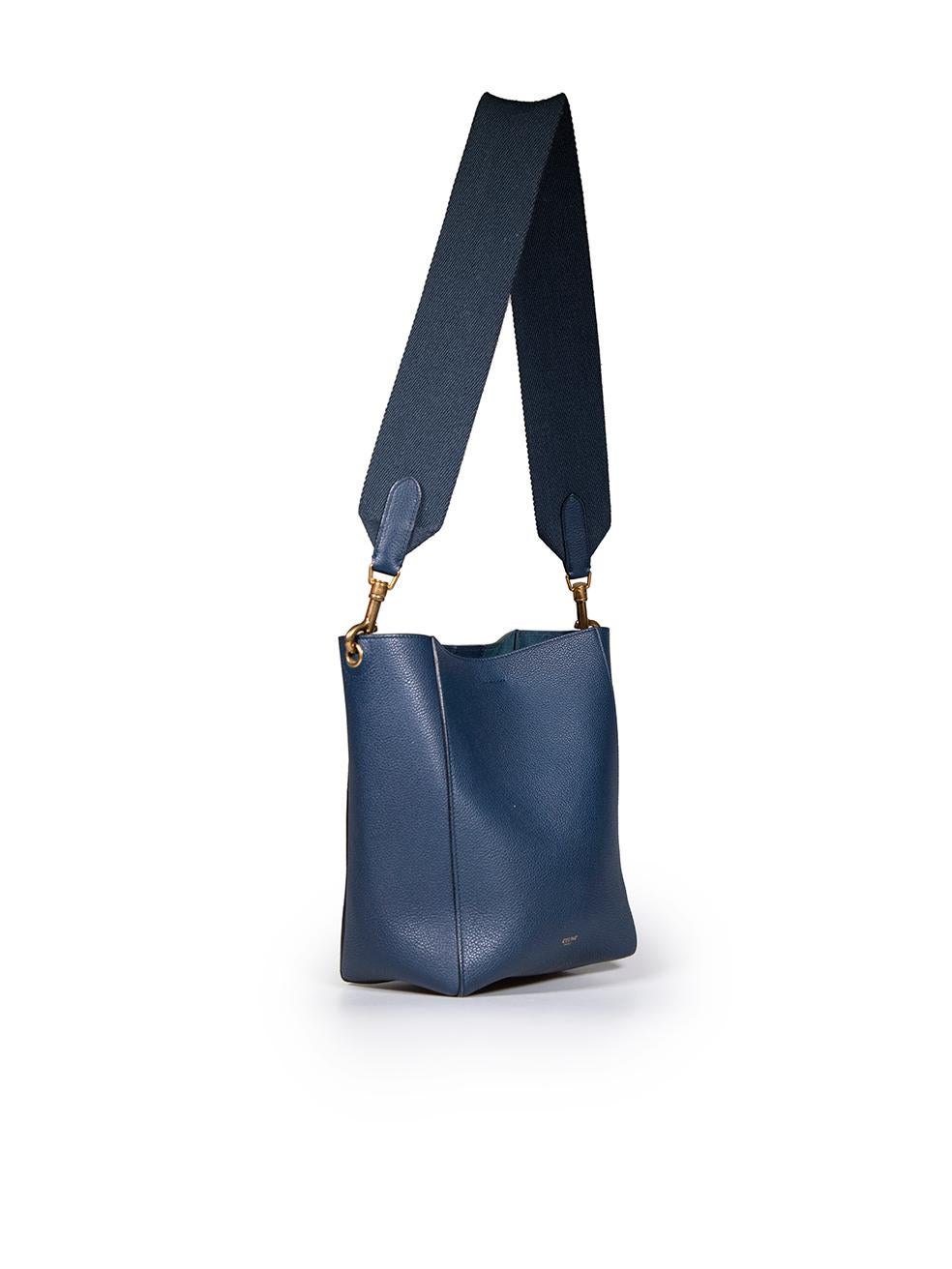 CONDITION is Very good. Minimal wear to bag is evident. Minimal wear to the base with abrasions to the leather on this used Céline designer resale item.
 
 
 
 Details
 
 
 Model: Seau Sangle
 
 Navy
 
 Leather
 
 Medium bucket bag
 
 Gold tone
