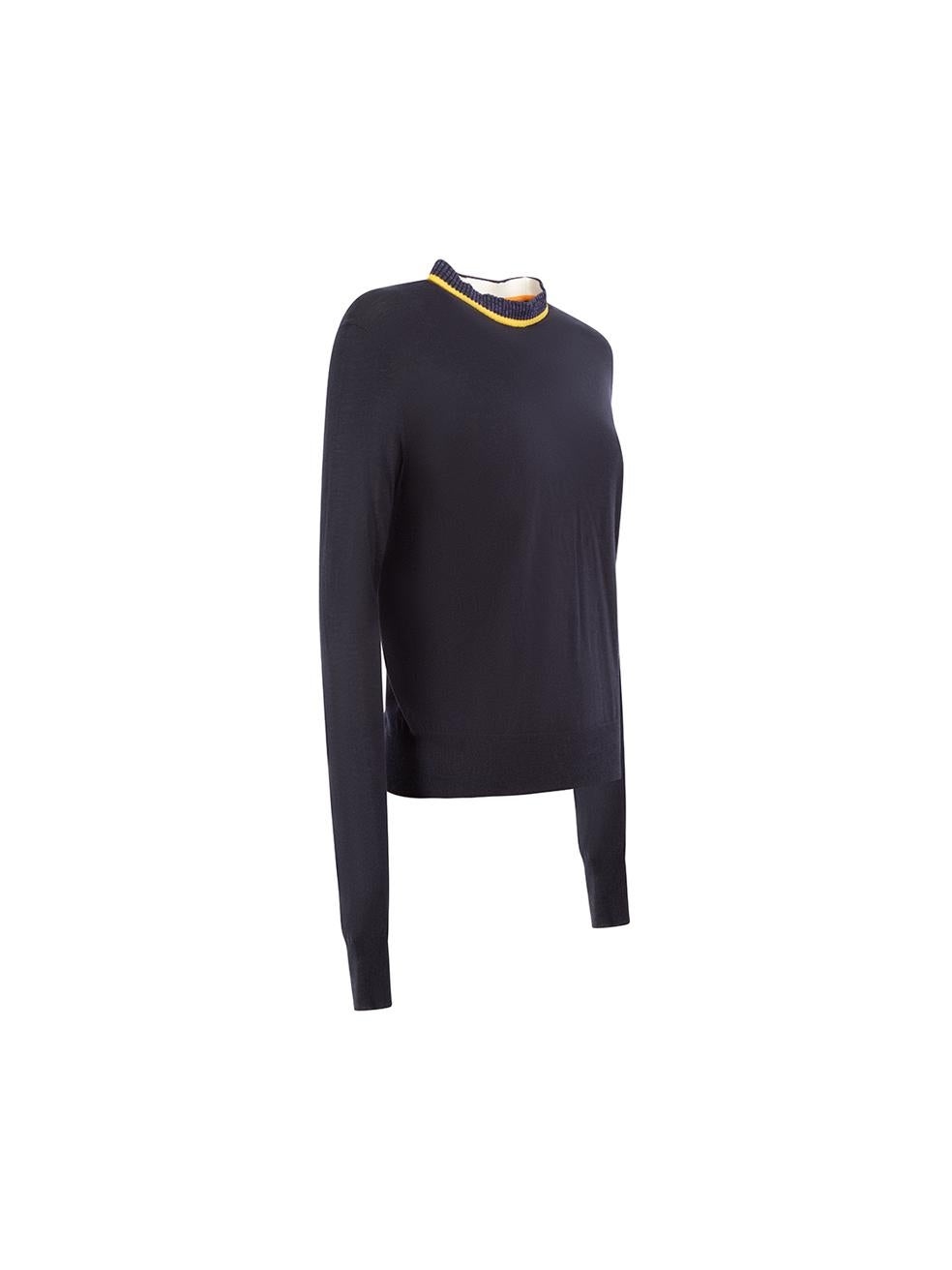 CONDITION is Very good. Minimal wear to jumper is evident. Minimal wear to the front and back with pulls to the knit on this used C√©line designer resale item.
  
Details
Navy
Wool
Knit jumper
Long sleeves
Round neck
Striped neck detail

Made in