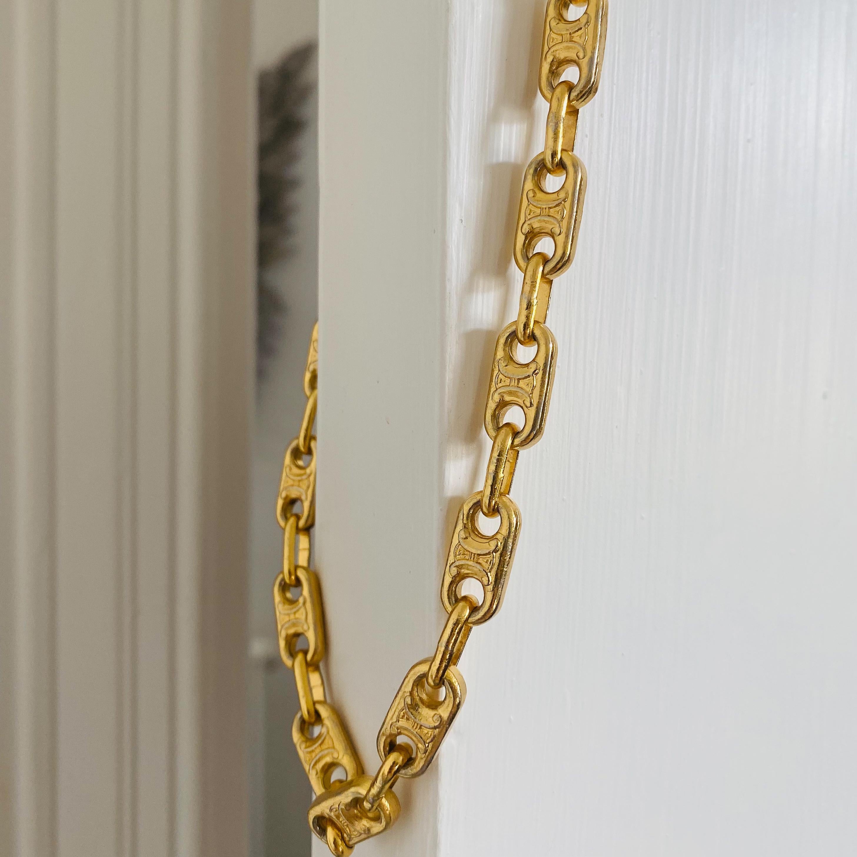 Celine Vintage 1970s Extra Long Necklace

An amazing chunky chain from the legendary house of Celine. Made in Italy in the 1970s from gold plated metal this extra long chain is constructed from the iconic macadam 'Triomphe' symbol Links. A super