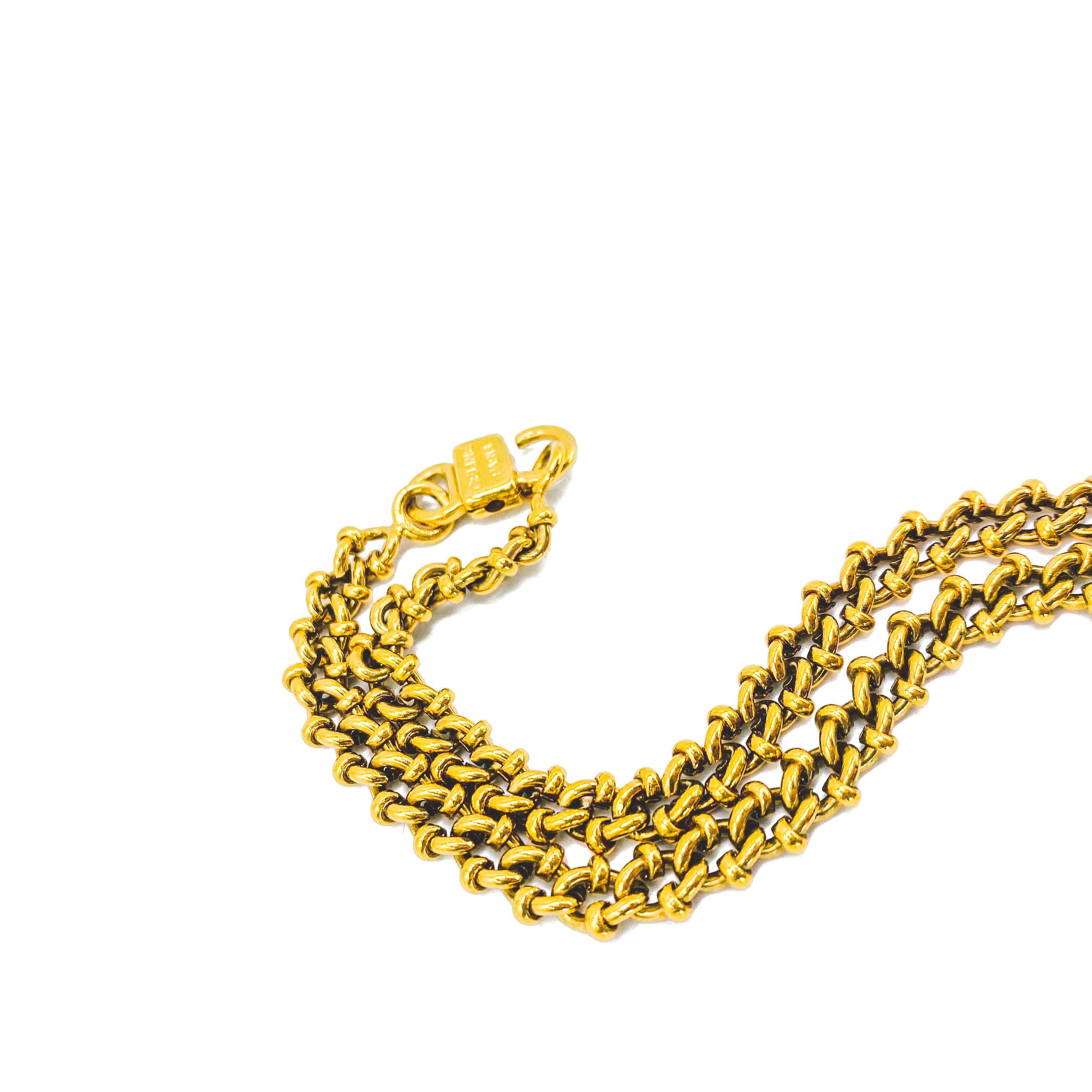 Celine Vintage 1980s Necklace

Detail
-Made in Italy in the 1980s
-Crafted from high quality gold plated metal
-Chunky chain with small triomphe macadam logos

Size & Fit
-Approx 35 inches in length

Authenticity & Condition 
-Fully examined and