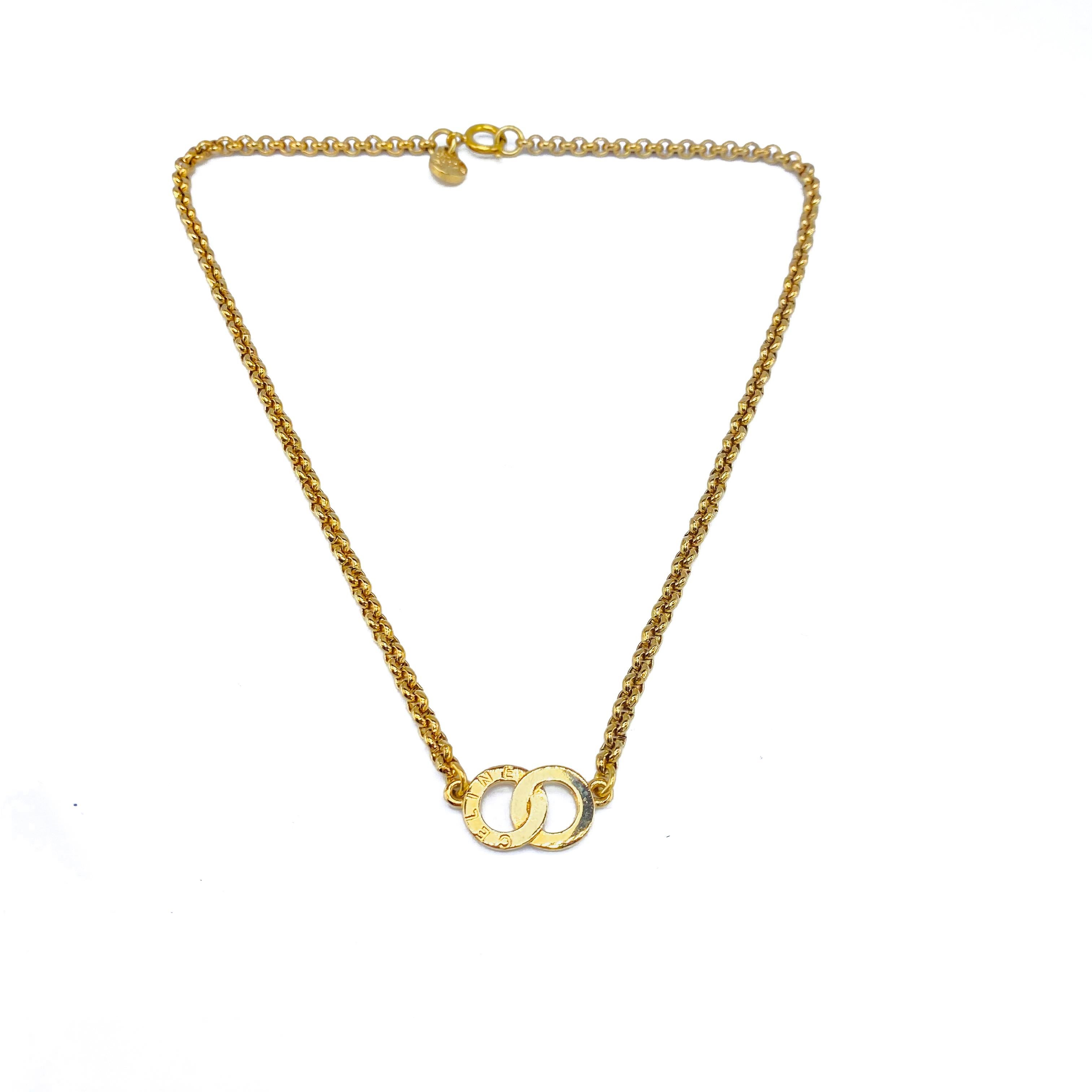 Celine Vintage 1990s Pendant Necklace

Timeless and versatile pendant from the 90s Celine archive

Detail
-Made in France in the 1990s
-Crafted from gold plated metal
-Small double loop pendant embossed with Celine
-Belcher chain

Size & Fit
-Length