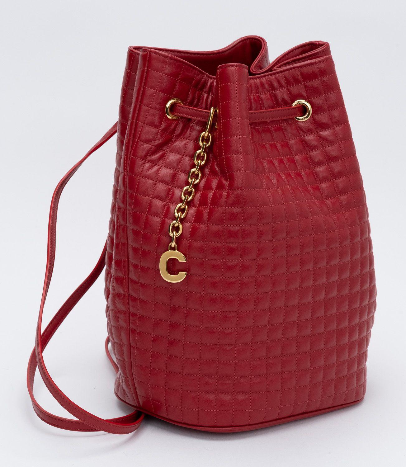 Celine Brand New  Red Quilted Leather Backpack, Gold metal hardware.
Red fabric lining inside.
Comes with generic dust cover and tag.