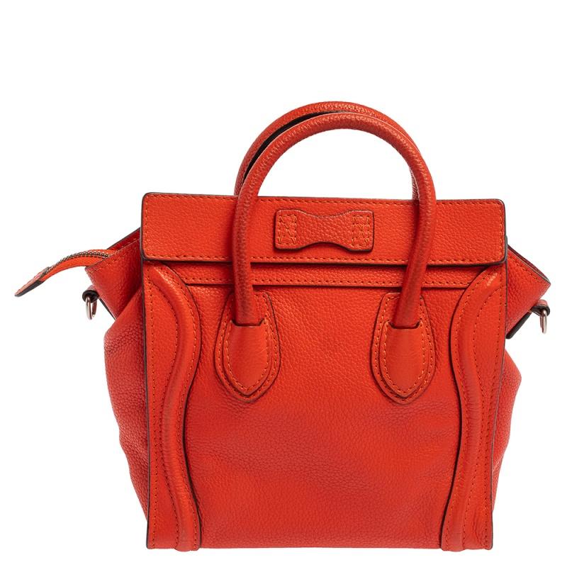 The Luggage tote from Celine is one of the most popular handbags in the world. This tote is crafted from leather and designed in an orange shade. It comes with rolled top handles, a detachable shoulder strap, and a front zip pocket for easy