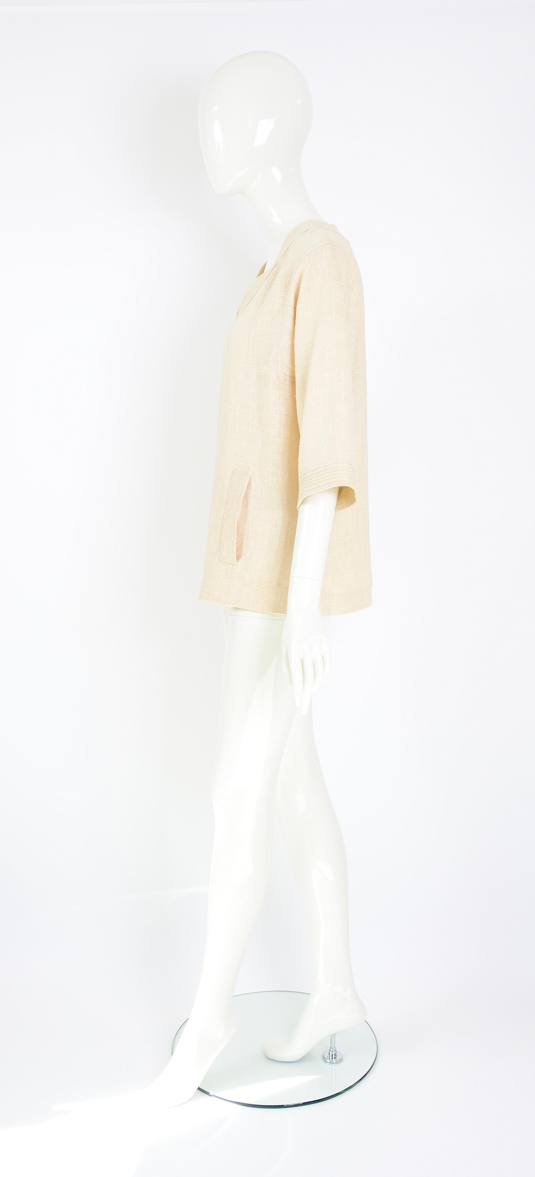 Women's Celine Paris vintage 1970s blouse made in linen or raw jute fabric.