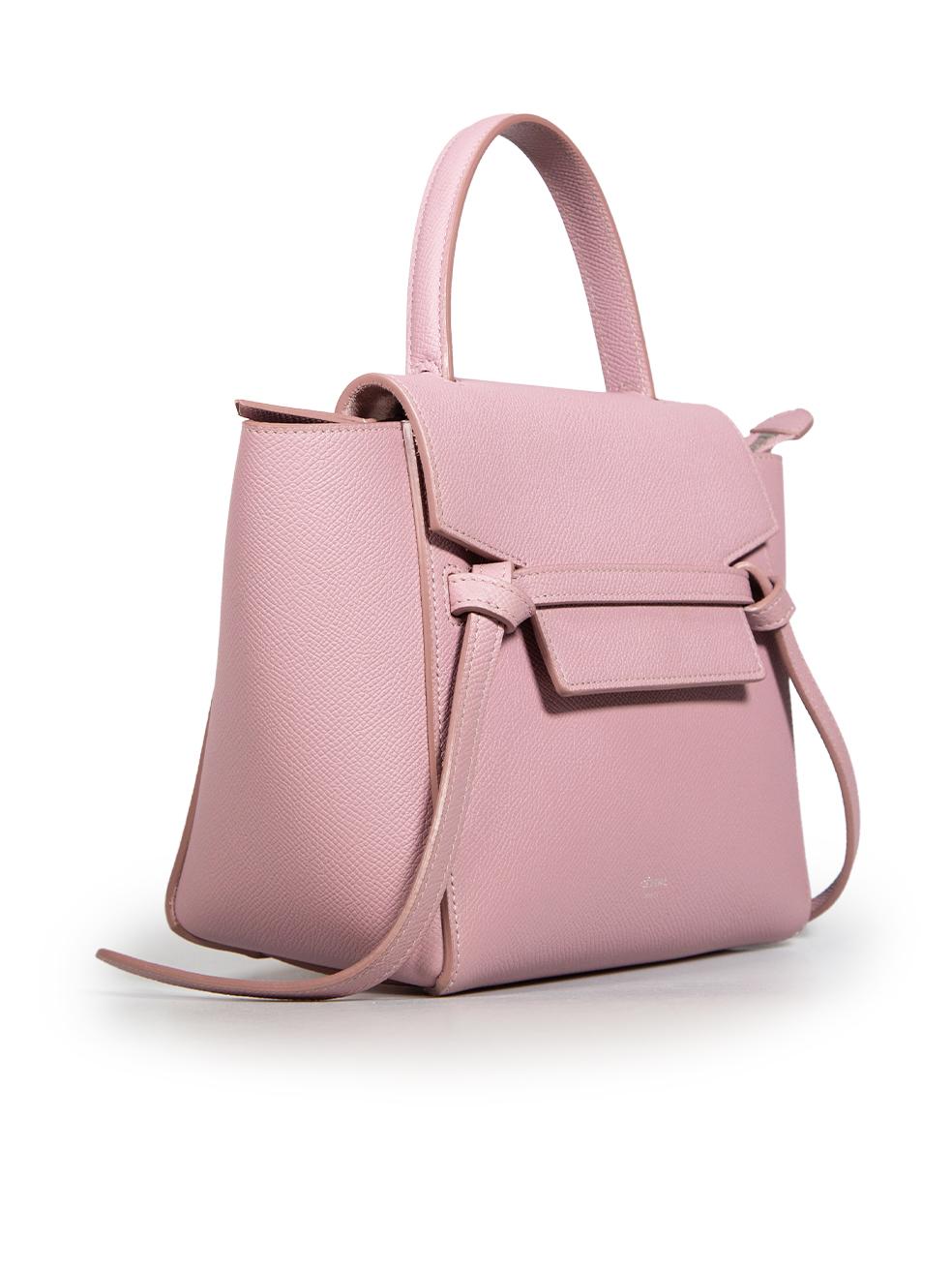CONDITION is Very good. Minimal wear to the bag is evident, there is a light mark on the front flap, the bottom front near the logo, the left side and the back two leather hoops to secure the shoulder strap on this used Céline designer resale item.
