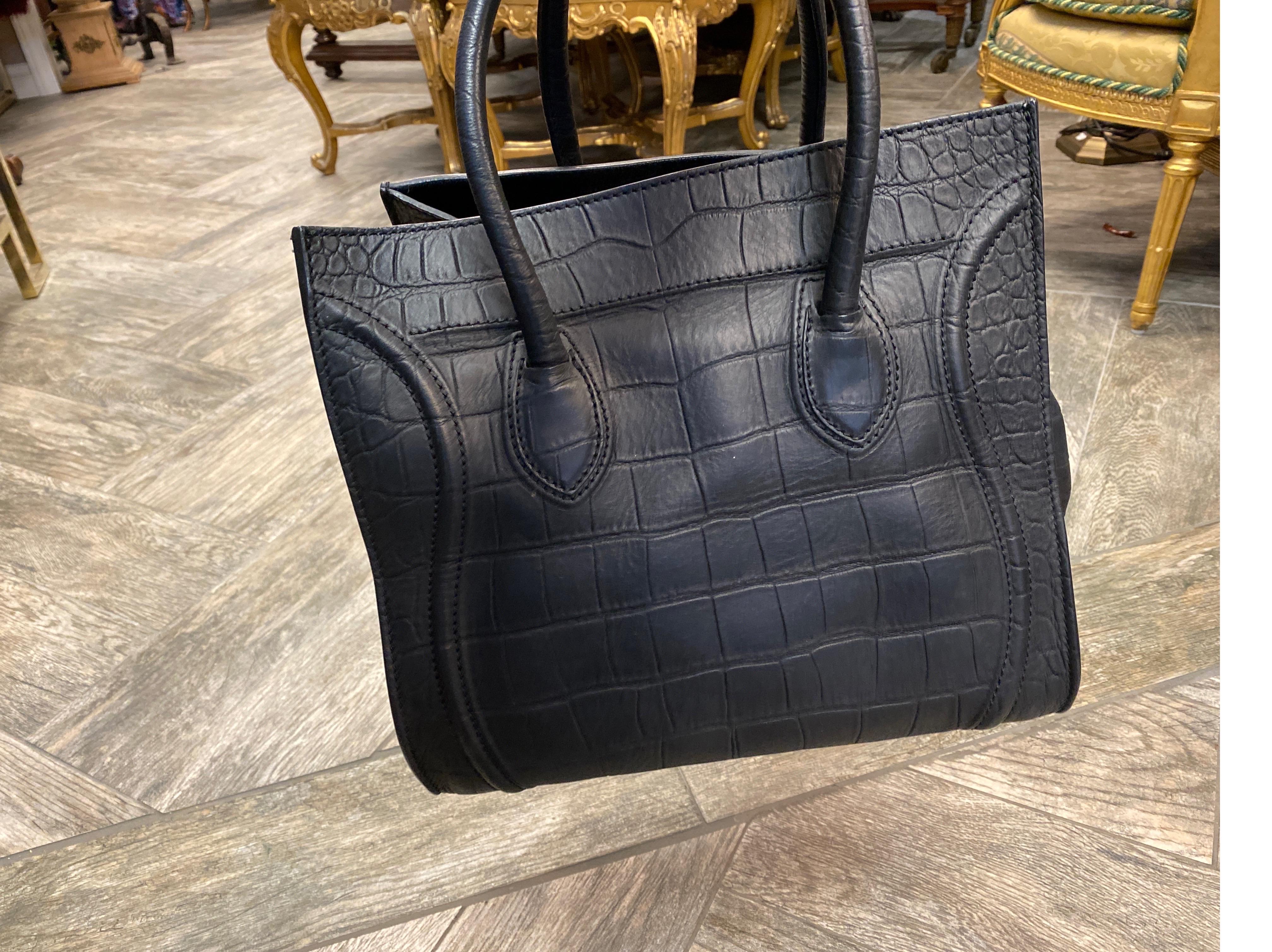 Original Celine
Black Crocodile
Condition: Excellent 
Dust Bad Included
Height with a Handle 15 Inches
Width 13 Inches 