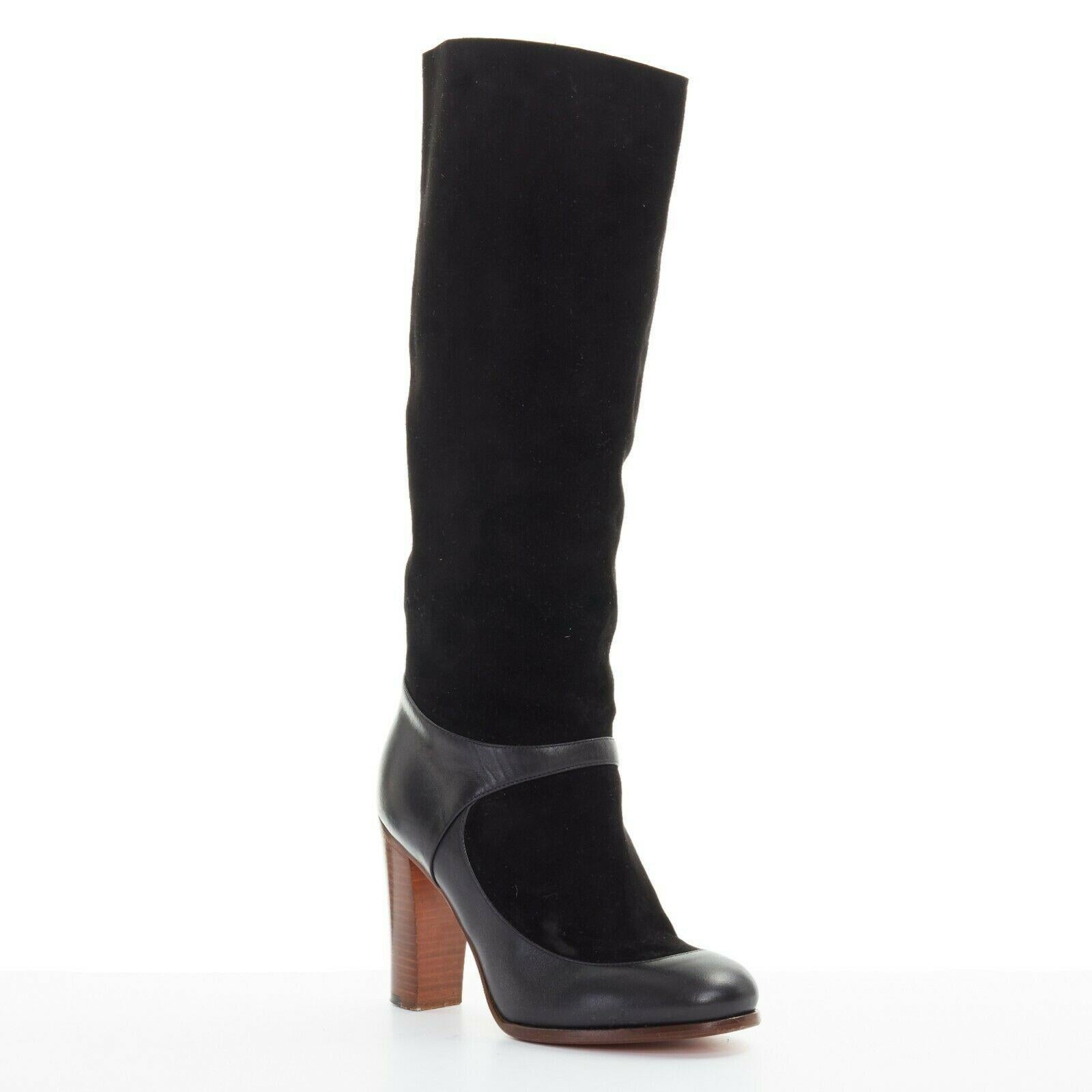 CELINE PHILO black suede sock ankle strap chunky wooden heel tall boot EU35.5
Designer: Celine
Material: Leather
Color: Black 
Extra Details: Suede leather upper. Black leather faux ankle strap maryjane shoe design. Round toe. Chunky stacked wooden