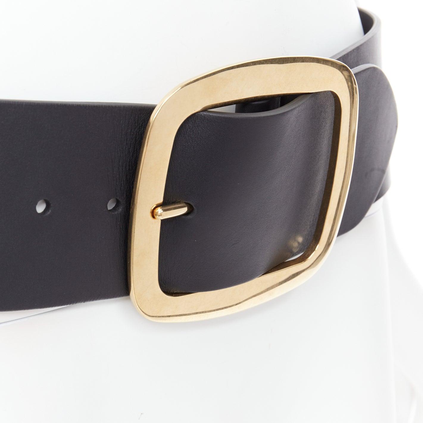 CELINE PHOEBE PHILO 2012 Runway black leather large gold square buckle oversized belt M
Reference: TGAS/E00604
Brand: Celine
Designer: Phoebe Philo
Collection: 2012 - Runway
Material: Leather, Metal
Color: Black, Gold
Pattern: Solid
Closure: