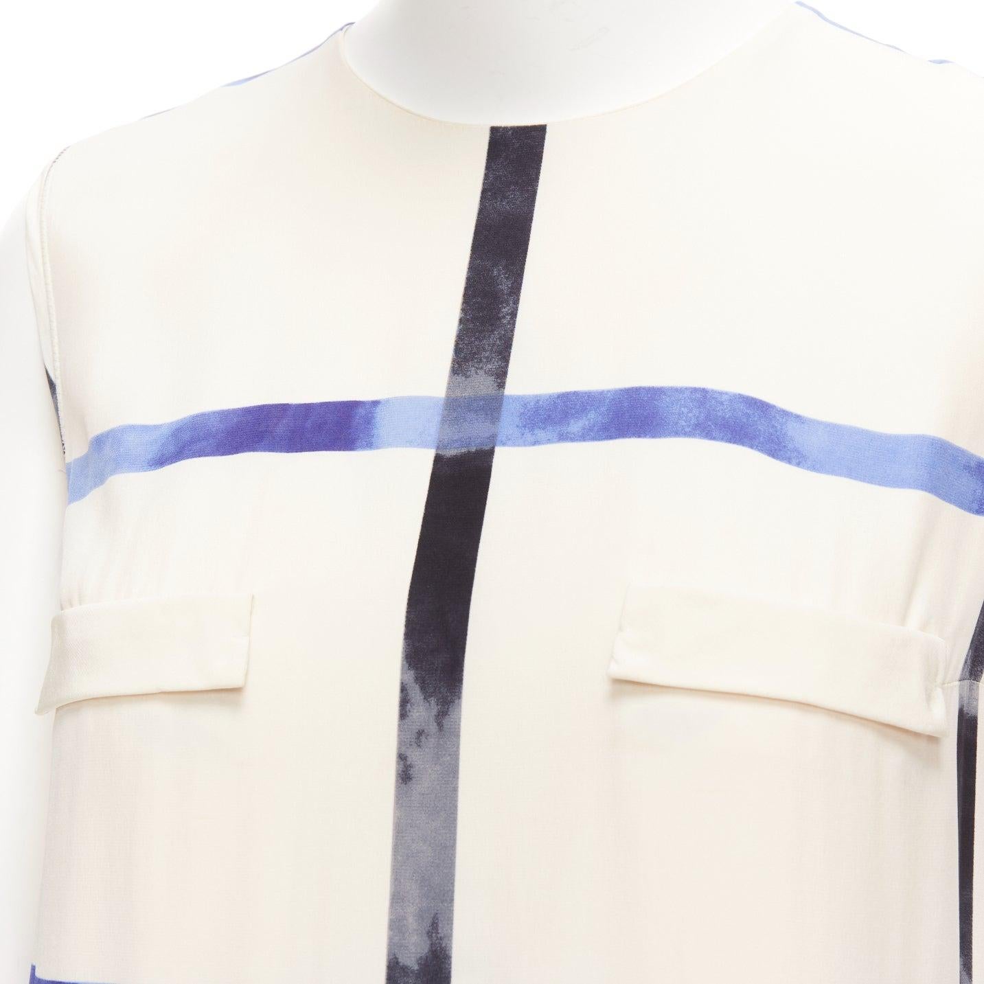 CELINE Phoebe Philo 2014 Runway cream blue 100% silk bias cut dress
Reference: EALU/A00019
Brand: Celine
Designer: Phoebe Philo
Collection: 2014 - Runway
Material: Silk
Pattern: Checkered
Closure: Zip
Lining: Cream Silk
Extra Details: Zip back.
Made