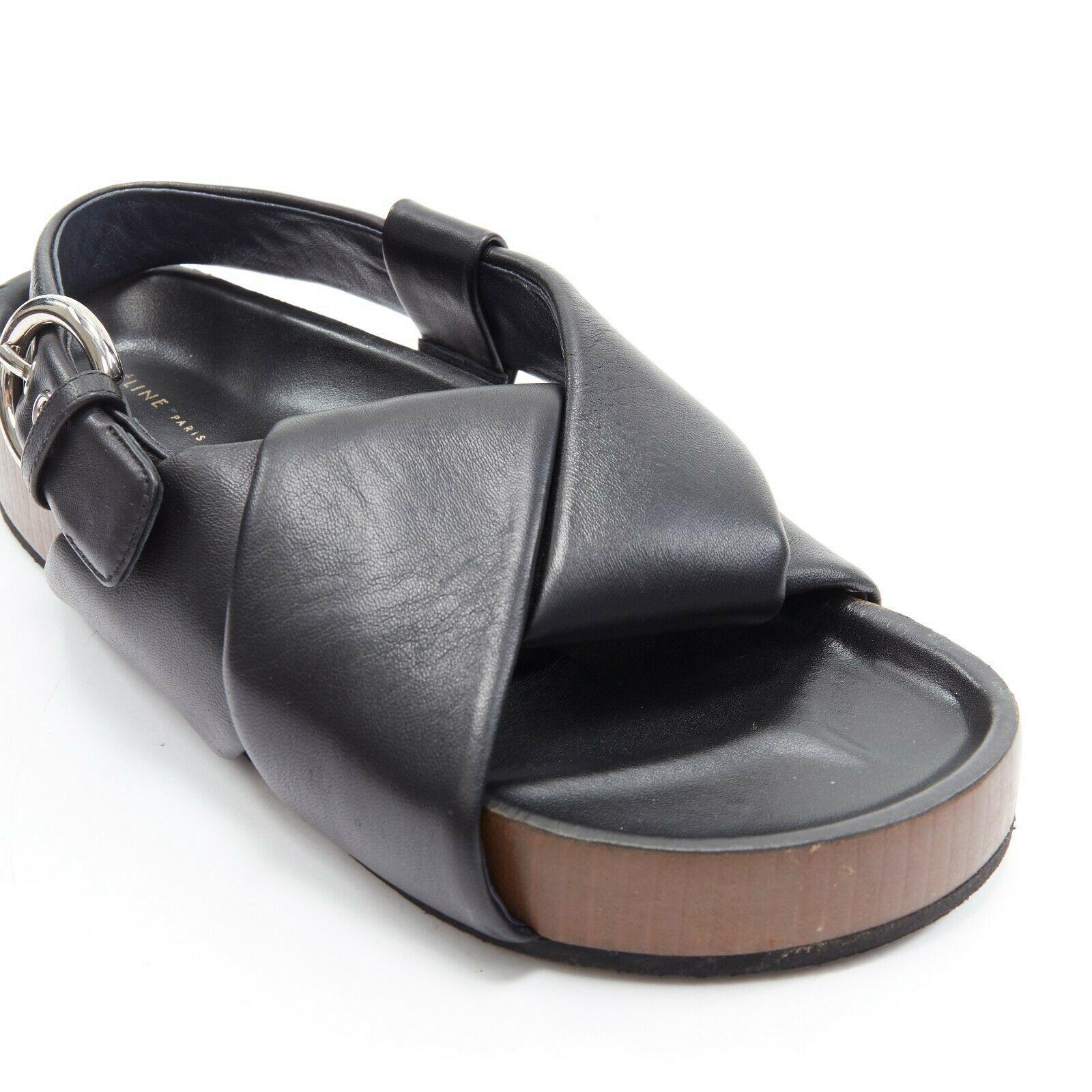 Women's CELINE PHOEBE PHILO black padded leather twist slides slingback sandals EU38