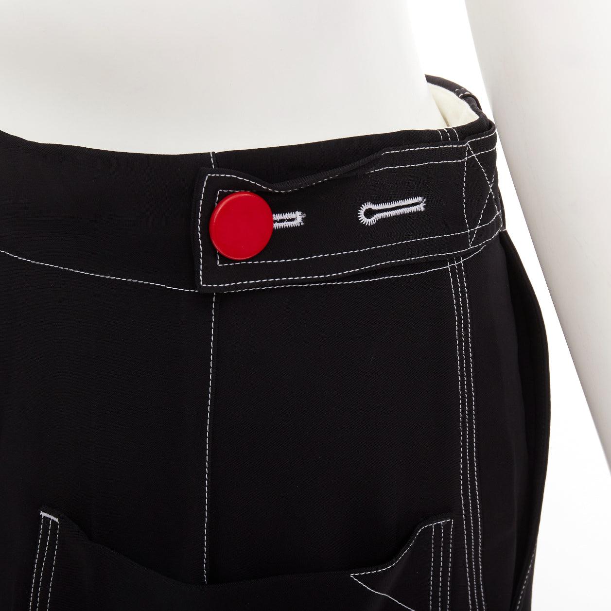 CELINE Phoebe Philo black white overstitch red button wide pants FR34 XS
Reference: MECG/A00134
Brand: Celine
Designer: Phoebe Philo
Material: Viscose
Color: Black, Red
Pattern: Solid
Closure: Button Fly
Extra Details: Red buttons at sides.
Made in: