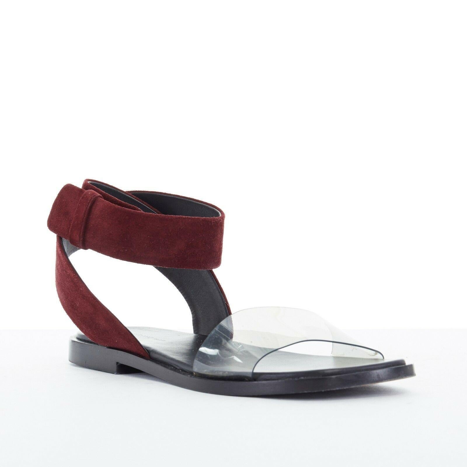 CELINE PHOEBE PHILO burgundy suede leather clear PVC flat sandals EU36 US6 UK3
Designer: Celine Phoebe Philo
Material: Leather
Color: Burgundy
Extra Details: Burgundy suede leather upper. Grey tinted clear PVC front strap. Black leather lining. Slip