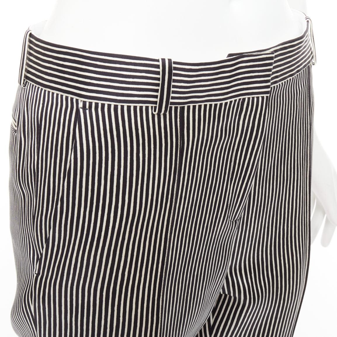 CELINE Phoebe Philo cream black silk new pure wool striped trousers FR36 S
Reference: NKLL/A00405
Brand: Celine
Designer: Phoebe Philo
Material: Silk, Wool
Color: Black, Cream
Pattern: Striped
Closure: Zip Fly
Extra Details: Back pockets.
Made in:
