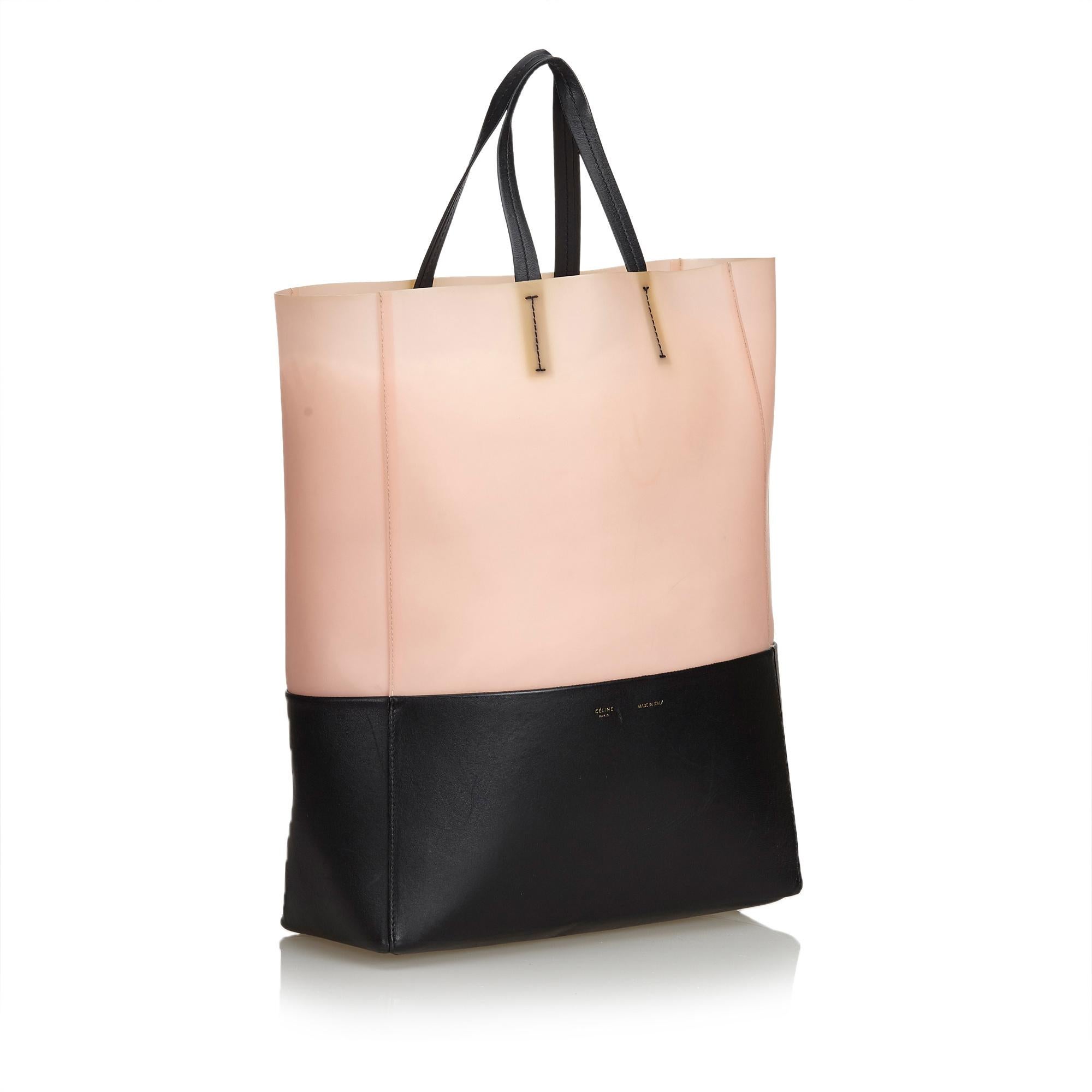 The Vertical Cabas tote features a rubber body with leather trim, flat leather handles, open top, and interior zip pocket. It carries as B condition rating.

Inclusions: 
This item does not come with inclusions.

Dimensions:
Length: 41.00 cm
Width: