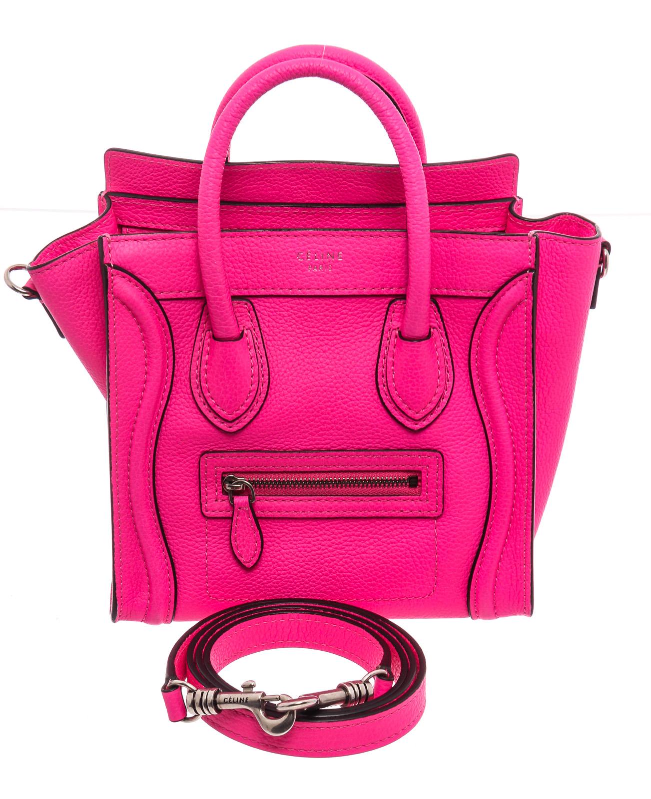 Pink leather Céline Nano Luggage tote with silver-tone hardware, dual rolled top handles, detachable flat shoulder strap, zip pocket at front, tonal hide interior, single slip pocket at interior wall and zip closure at top. 

22079MSC

