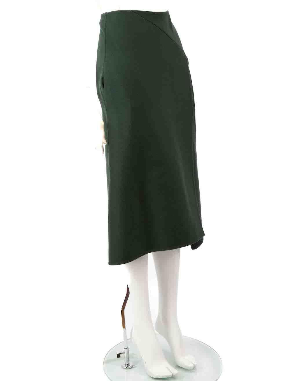 CONDITION is Very good. Hardly any visible wear to the skirt is evident. However, due to poor storage, there is a mark on the brand label on this used Céline designer resale item.
 
 
 
 Details
 
 
 Green
 
 Wool
 
 Skirt
 
 A-line
 
 Midi
 
 Front