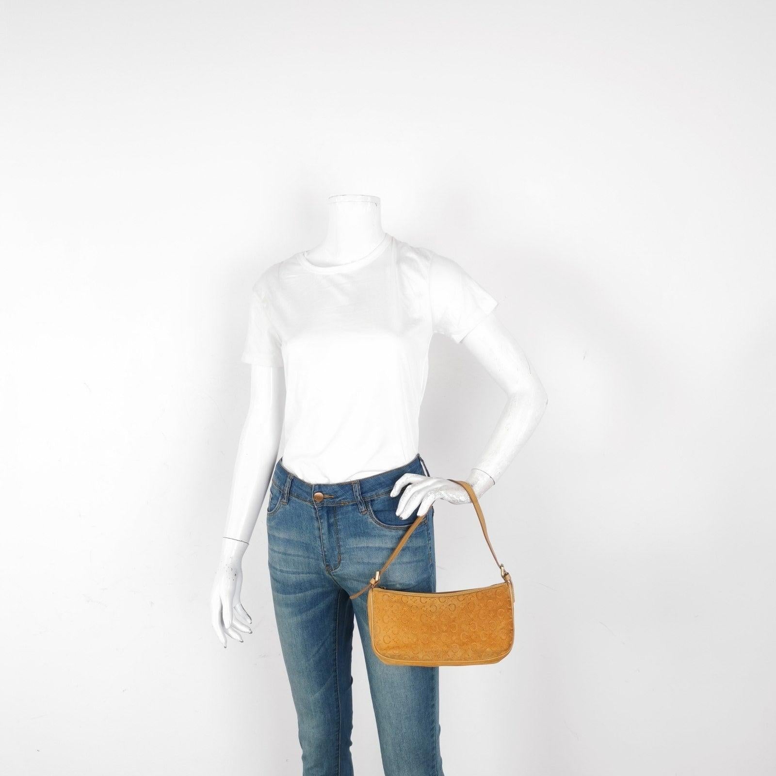 Celine Pochette Clutch Baguette Shoulder Bag Pumpkin Caramel Brown Suede Leather These are professional photos of the actual bag offered by Luxbags. 
 
 CONDITION: VERY GOOD This preloved item is in very good condition with light signs of use