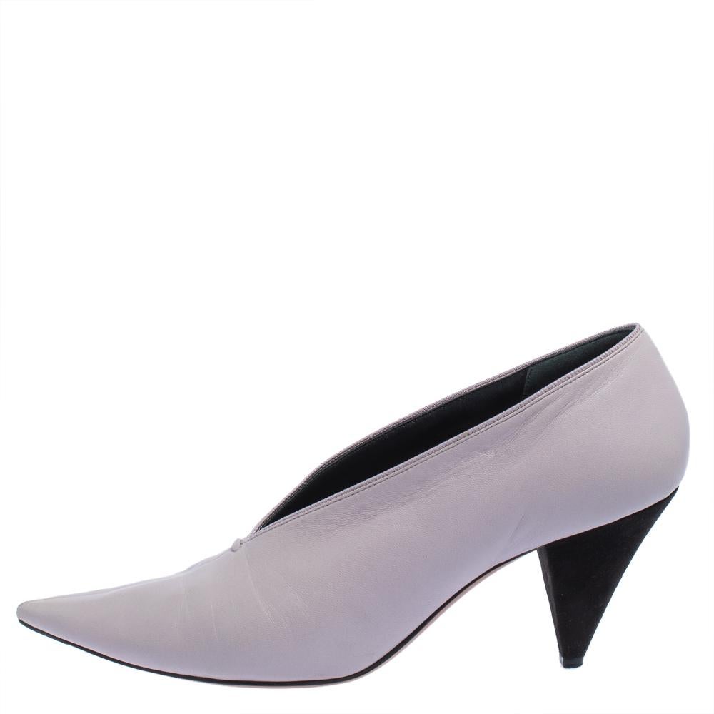 You are sure to fall head over heels in love with this pair of V Neck pumps from Celine. These stylish pumps will add a touch of elegance to any outfit. Crafted in Italy, they are made from quality leather and come in a shade of purple. They are