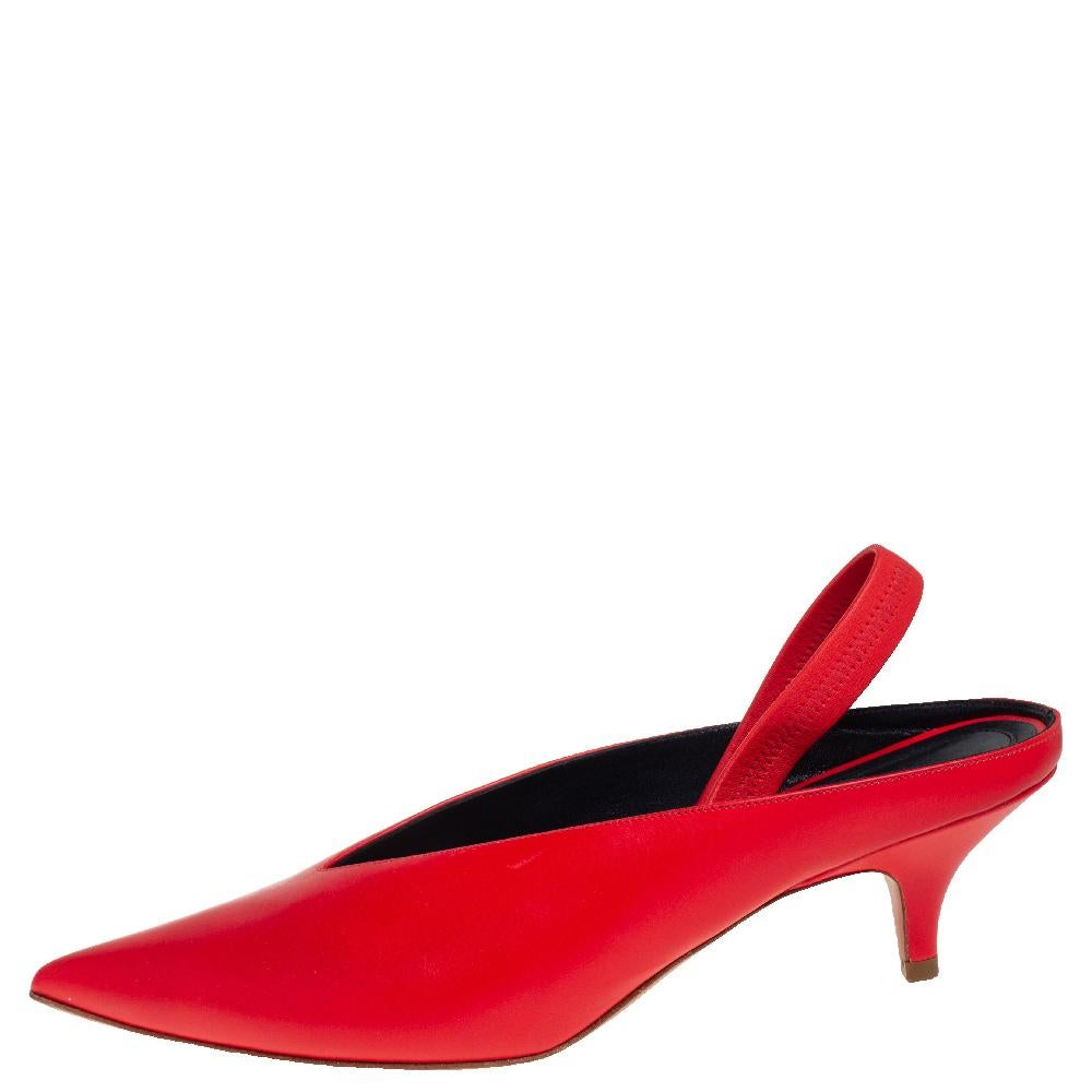 You are sure to fall head over heels in love with this pair of V Neck sandals from Celine. The exterior of these sandals has been crafted from red leather and is designed with a V-shaped cut at the vamps. They feature pointed toes, slingbacks and 6