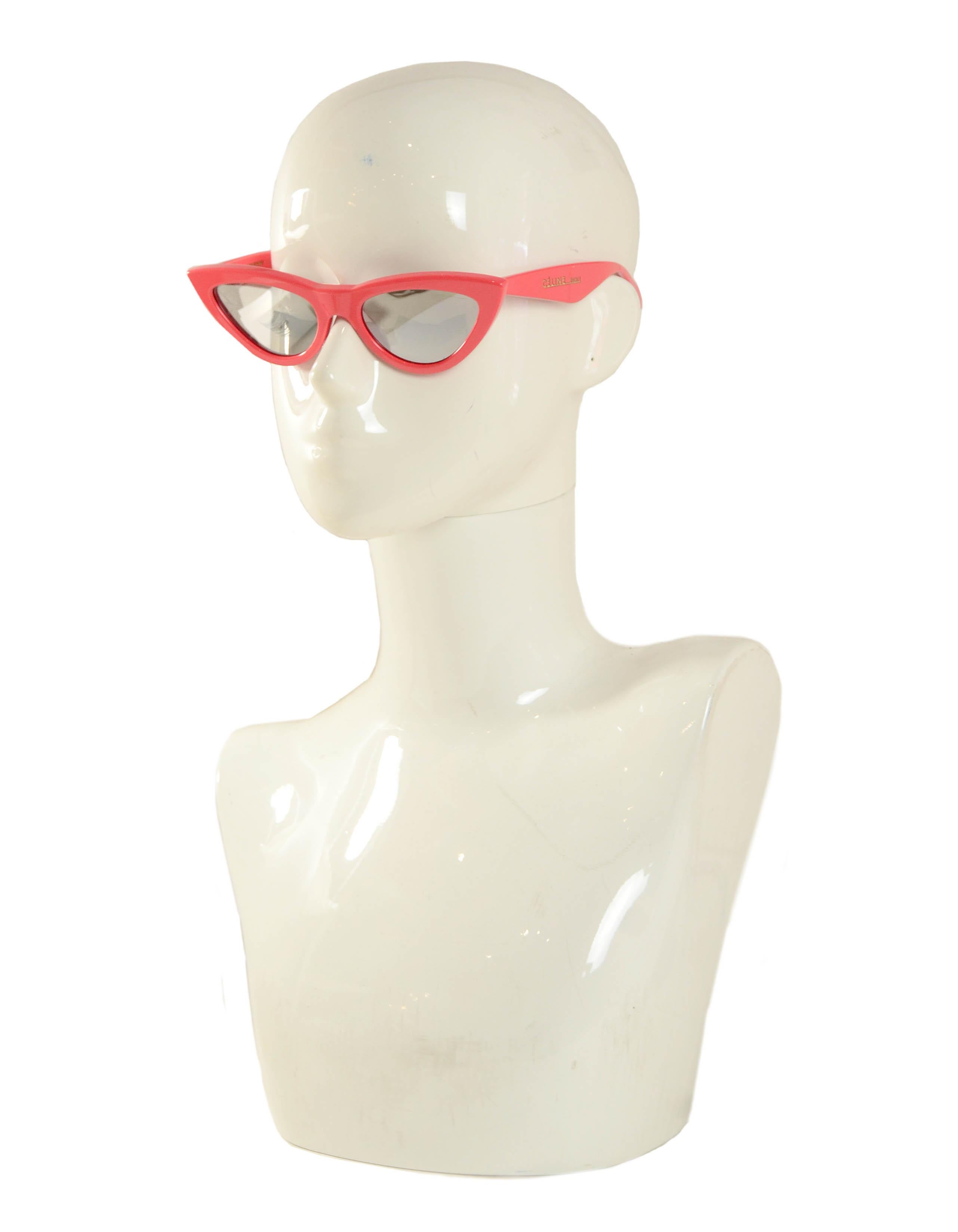 Celine Red Mirrored 56MM Cat Eye Sunglasses CL400191

Made In: Italy
Color: Red with silver mirror lenses
Hardware: Gold
Materials: Acetate
Overall Condition: Excellent
Estimated Retail: $460 plus tax
Includes: Celine box, case, cleaning