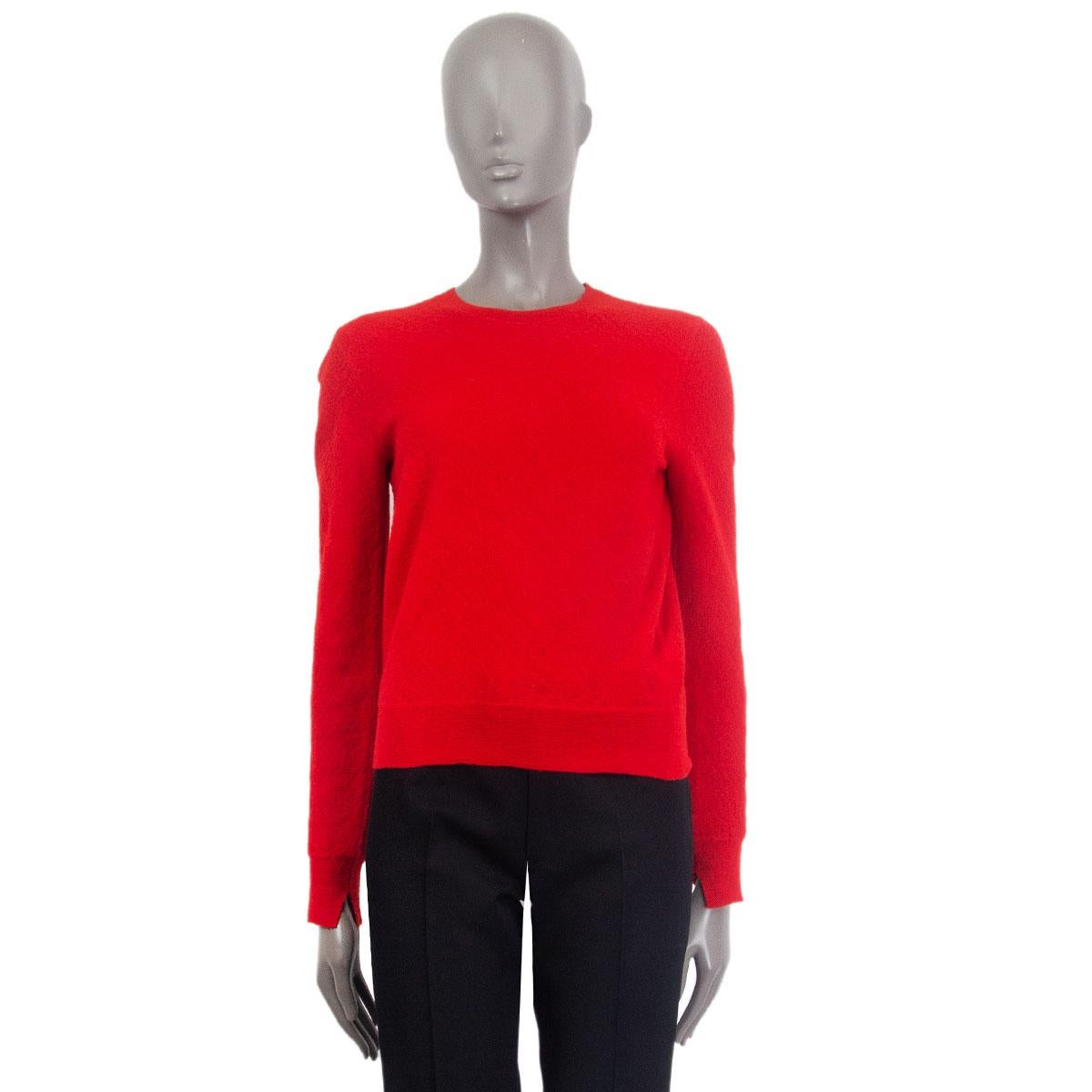 100% authentic Celine knit sweater in red wool (100%) with crew neck and long sleeves. Has been worn and is in excellent condition.

Tag Size L
Size L
Shoulder Width 37cm (14.4in)
Bust 90cm (35.1in)
Waist 82cm (32in)
Length 52cm (20.3in)
Side Seam