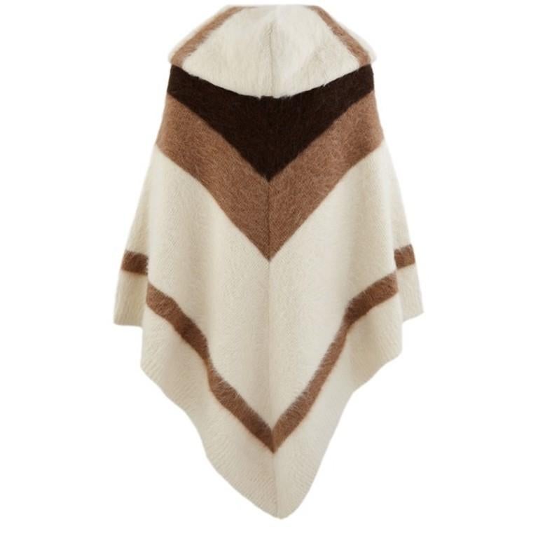 Celine Runway Striped Alpaca Blend Hooded Knit Poncho

- Luxurious soft alpaca knit texture 
- Gorgeous chevron striped pattern 
- Triangular cut 
- Hood 
- Ribbed hem
- Practical comfortable design, ideal for the cold weather 

Materials:
74%