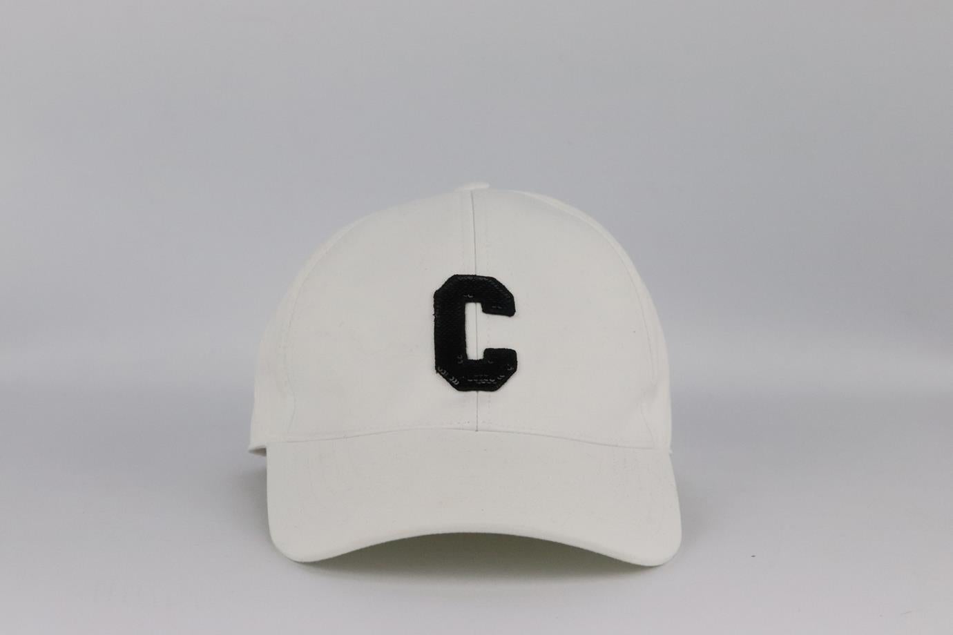 Celine sequin embellished cotton twill baseball cap. White. Slide fastening at back. Does not come with dustbag. Size: Small. Circumference: 22 in. Brim Width: 3 in. Very good condition - Small mark on interior fabric; see pictures.