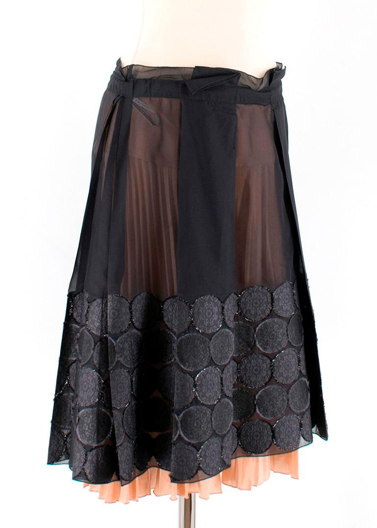 Celine Sheer Circle A Line Skirt

-A line knee length skirt
-Sheer skirt with pink underlay
-Pleated underlay
-Button and zip closure
-Circle pattern towards the hemline

Approx.
Measurements are taken laying flat, seam to seam. 

Length -