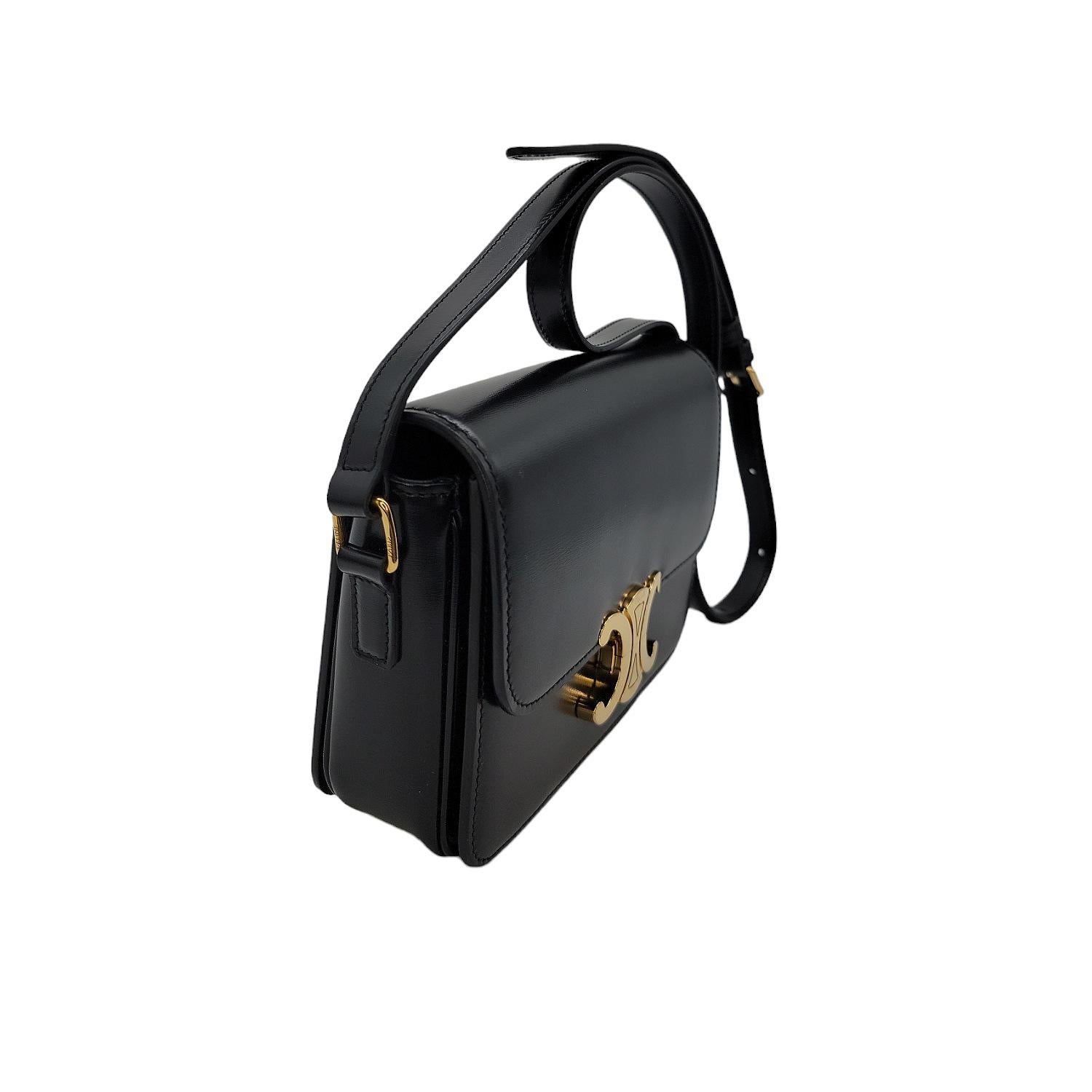 This Shiny Teen Triomphe Shoulder Bag is crafted of smooth calfskin leather in black. This bag features an adjustable leather shoulder strap with gold-tone hardware, and a matching gold-tone press latch on the crossover flap that opens to a
