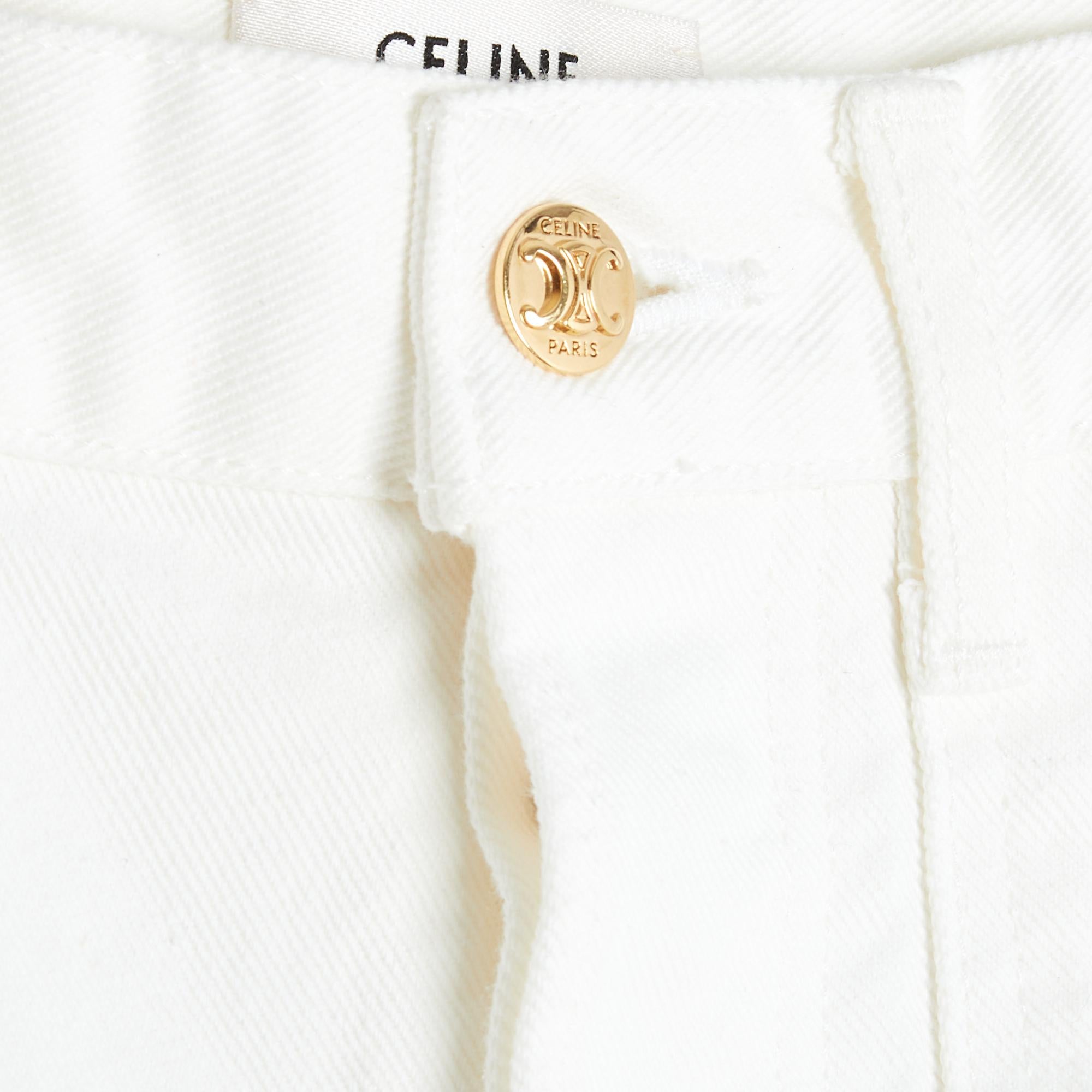 Celine by Hedi Slimane mid-rise cargo-style shorts in thick white denim, 4 pockets, 2 of which are closed with gold-tone metal Triomphe snaps, belt loops and gold-tone metal Triomphe button closure, small stitched turn-up at the bottom of the