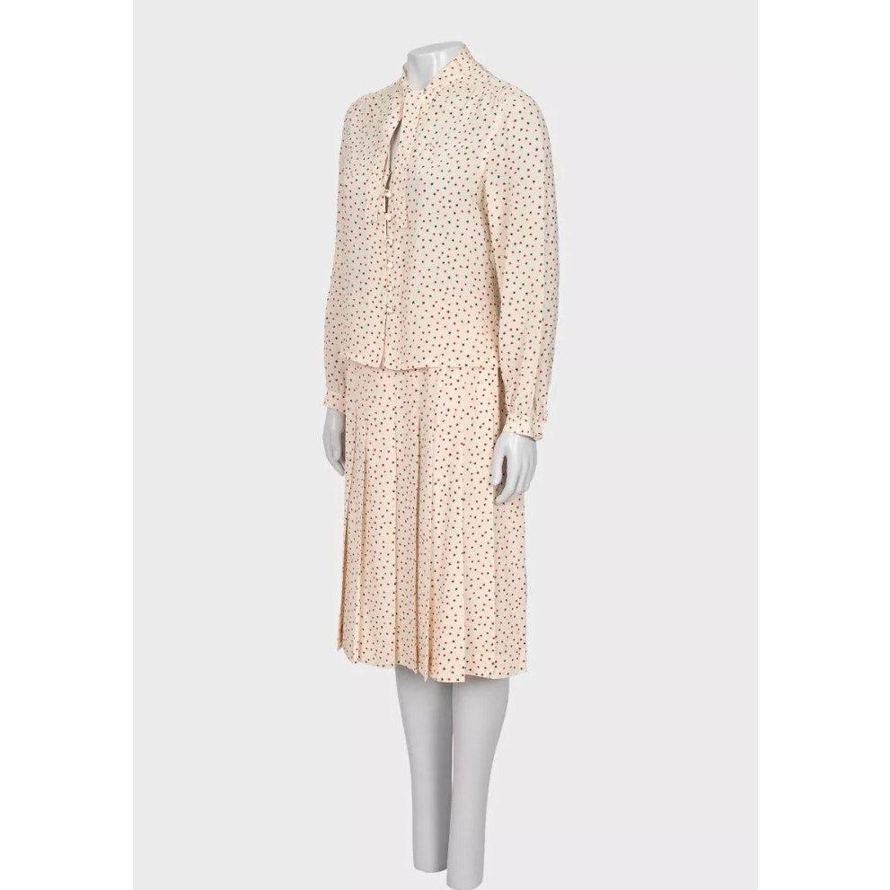 Step out in style with this stunning Celine silk set! This elegant two-piece outfit features a beautifully printed blouse and a matching skirt, perfect for making a sophisticated statement. Note that size FR44 (XXL) runs small, so please check the