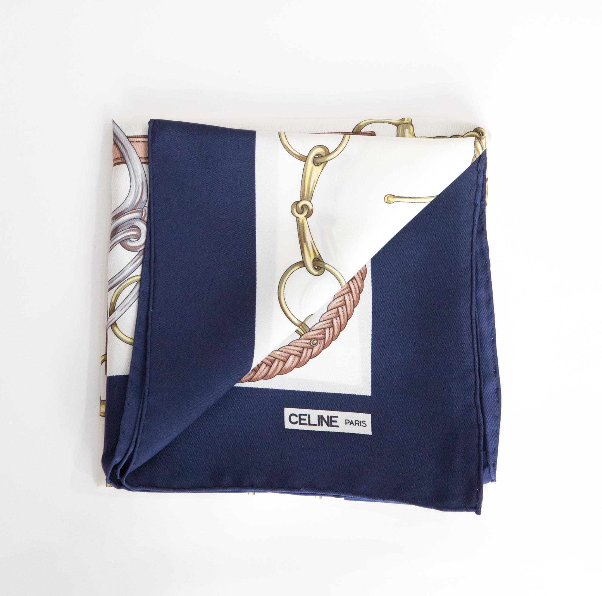 Celine Silk Scarf featuring a navy border, a Celine signature. 
Circa 1980s
In good vintage condition. Made in France.
30.7in (78cm)  X 30.7in (78cm)
We guarantee you will receive this  iconic item as described and showed on photos.
(please enlarge