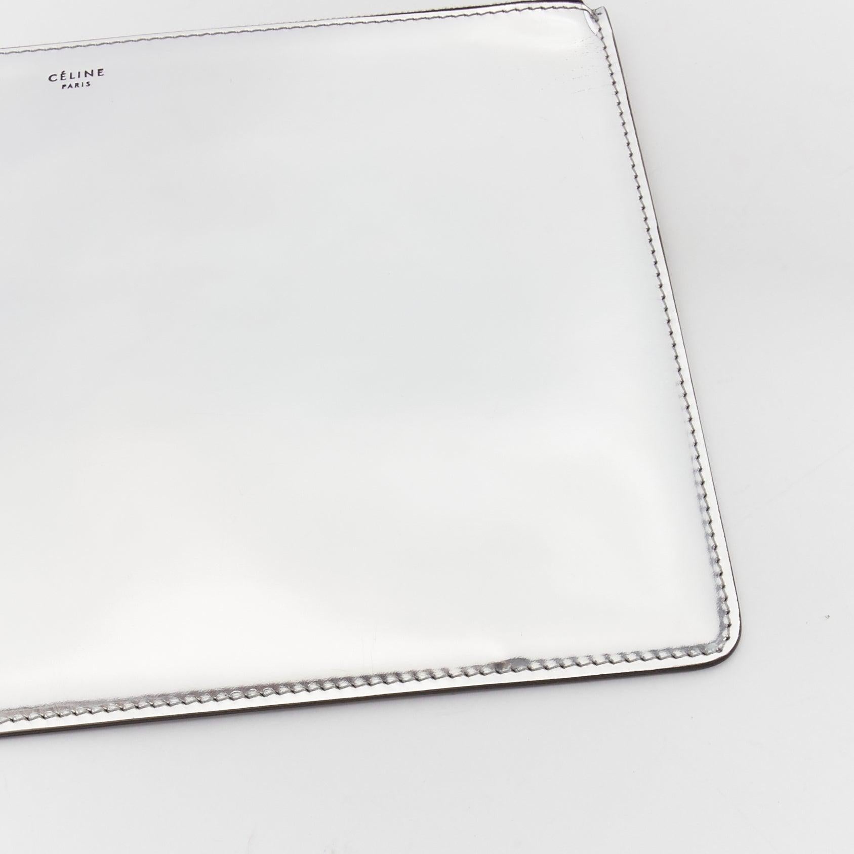 CELINE silver mirrored leather flat O ring zip pouch clutch bag In Good Condition In Hong Kong, NT