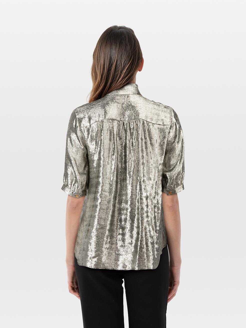 CONDITION is Very good. Minimal wear to the top is evident. Plucks to the weave on the front left, both sleeves, back and right side of the neck tie on this used Céline designer resale item.
 
 Details
 
 
 Silver
 
 Silk
 
 Blouse
 
 Mid sleeves
 
