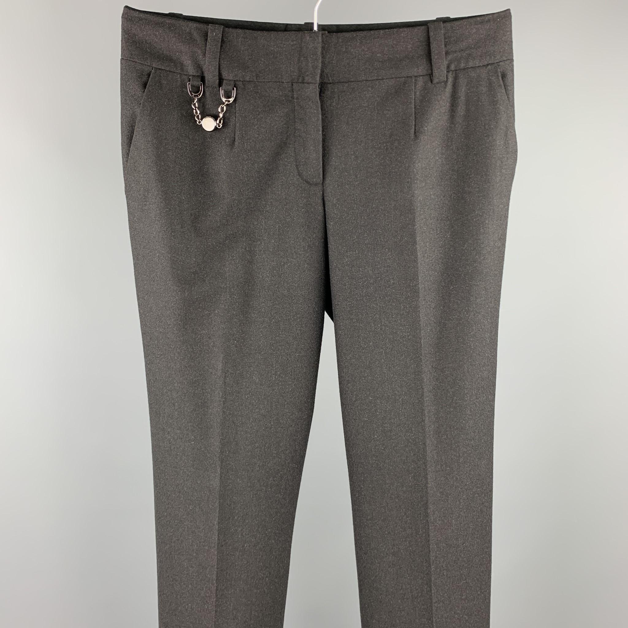CELINE dress pants comes in a charcoal wool / elastane featuring a wide leg, metal chain detail, and a zip fly closure. 

Excellent Pre-Owned Condition.
Marked: 40

Measurements:

Waist: 32 in. 
Rise: 7.5 in. 
Inseam: 31 in. 