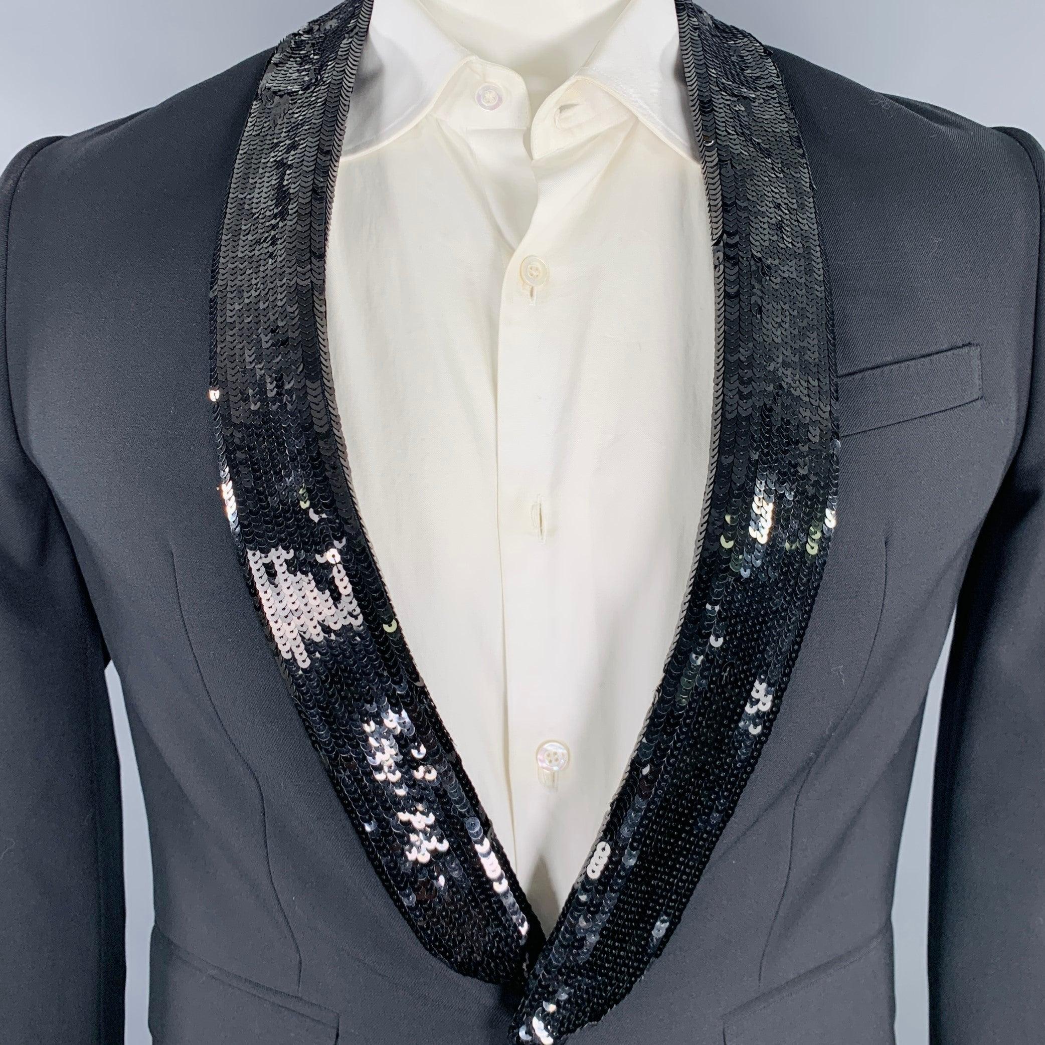 CELINE sport coat
in a black wool mohair fabric featuring a sequined shawl collar, single vented back, and single button closure. Made in Italy. Note: this garment has been professionally altered. Please double check measurements.Excellent Pre-Owned