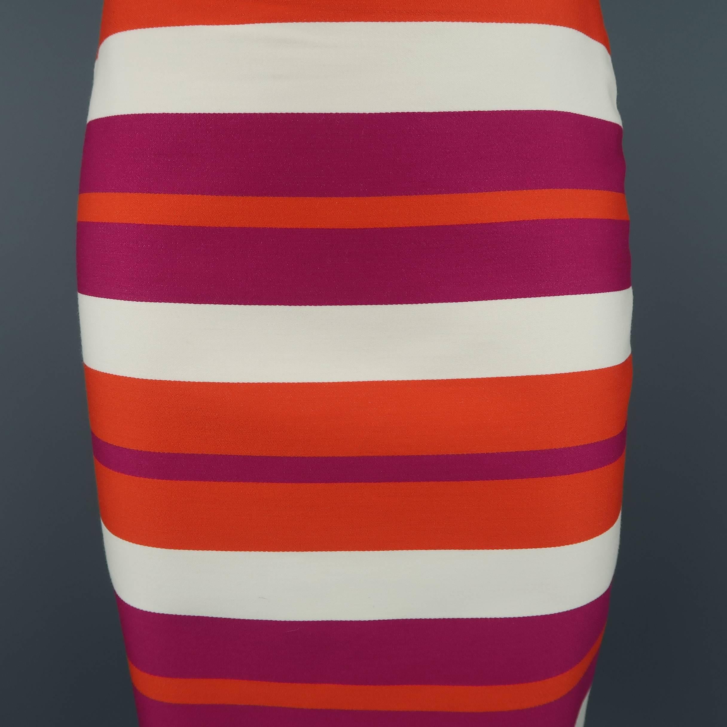 CELINE mini skirt comes in fuchsia, orange, and cream striped wool with a classic pencil skirt silhouette. Made in France.
 
Good Pre-Owned Condition.
Marked: FR 38
 
Measurements:
 
Waist: 27 in.
Hip: 36 in.
Length: 19 in.
