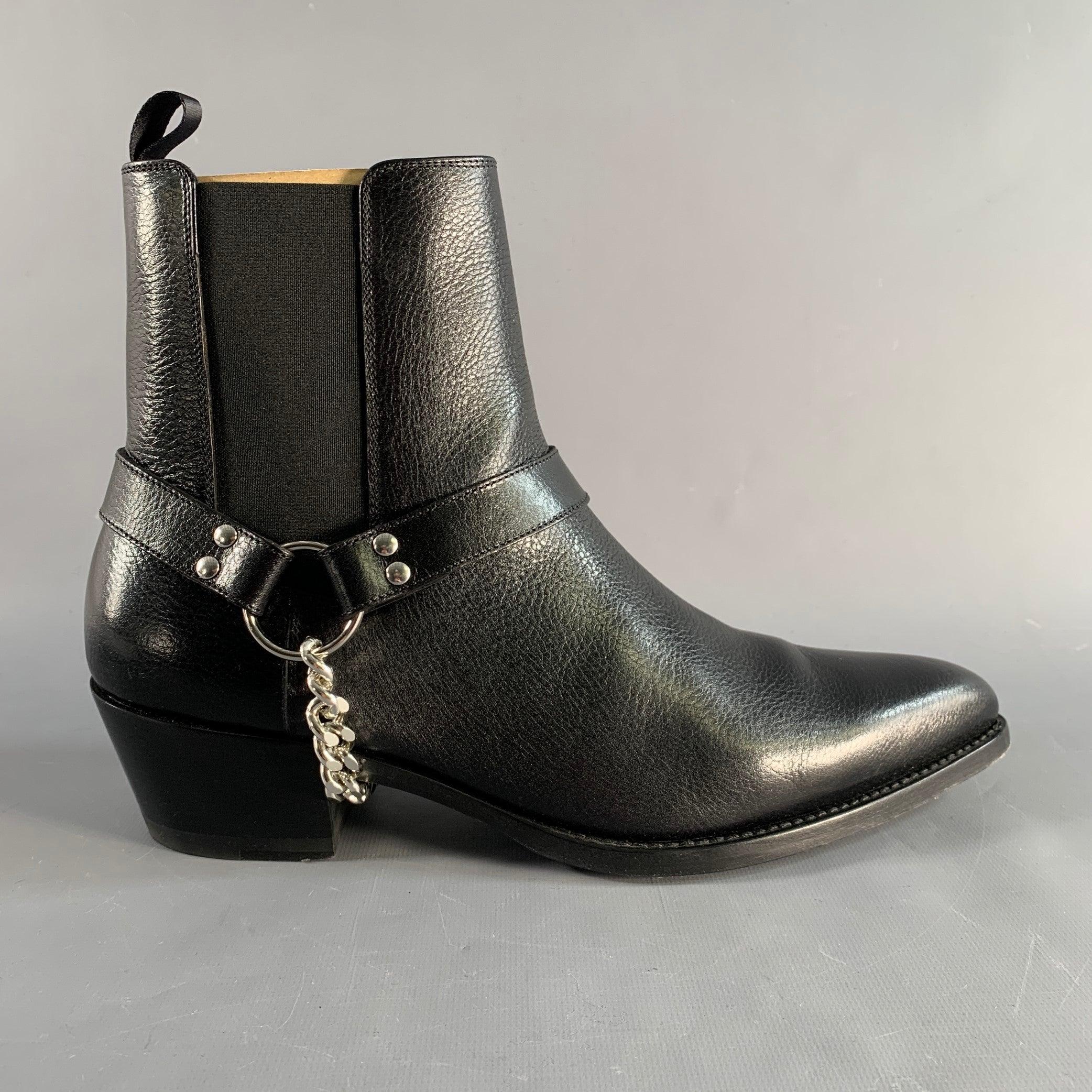CELINE boots in a black leather featuring pointed toe, ankle style, silver tone harness detail. Comes with box and dust bag. Made in Italy.Excellent Pre-Owned Condition. 

Marked:   MG2212 IT 42 

Measurements: 
  Length: 11.5 inches Width: 4 inches