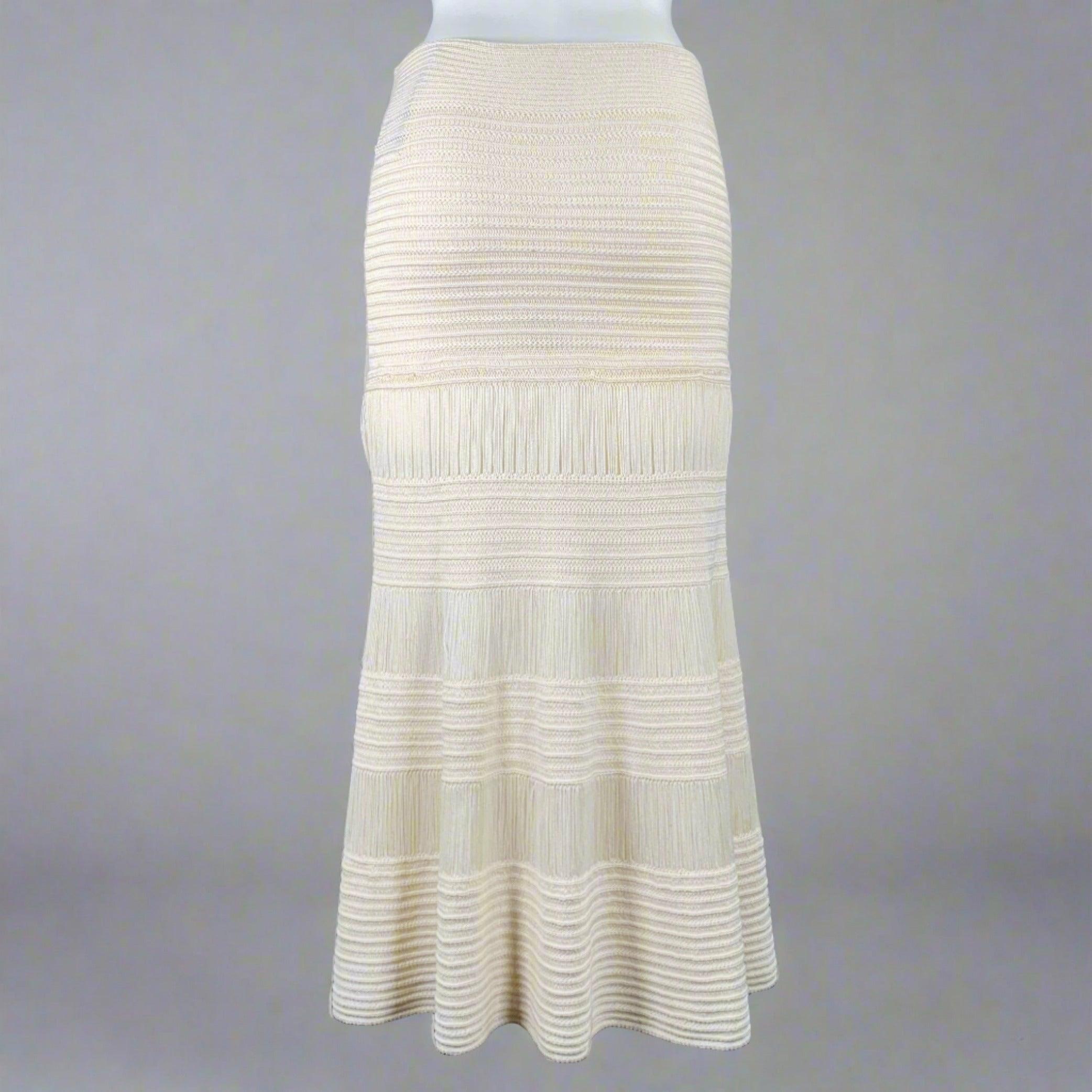 CELINE skirt
in a cream silk cotton knit fabric featuring a maxi style, and elastic waistband. Made in Italy.Very Good Pre-Owned Condition. Minor marks and signs of wear. 

Marked:  
 M 

Measurements: 
  Waist: 28 - 38 inches Hip: 40 inches Length:
